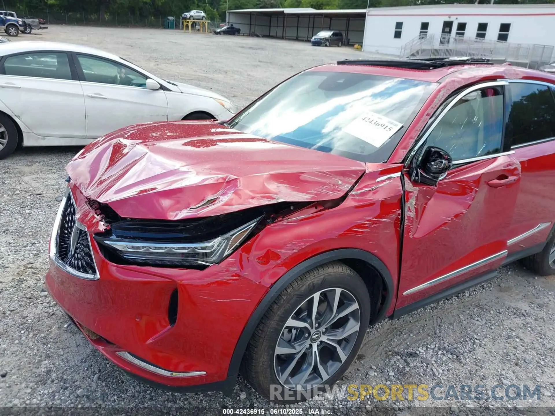 6 Photograph of a damaged car 5J8YE1H40PL007347 ACURA MDX 2023
