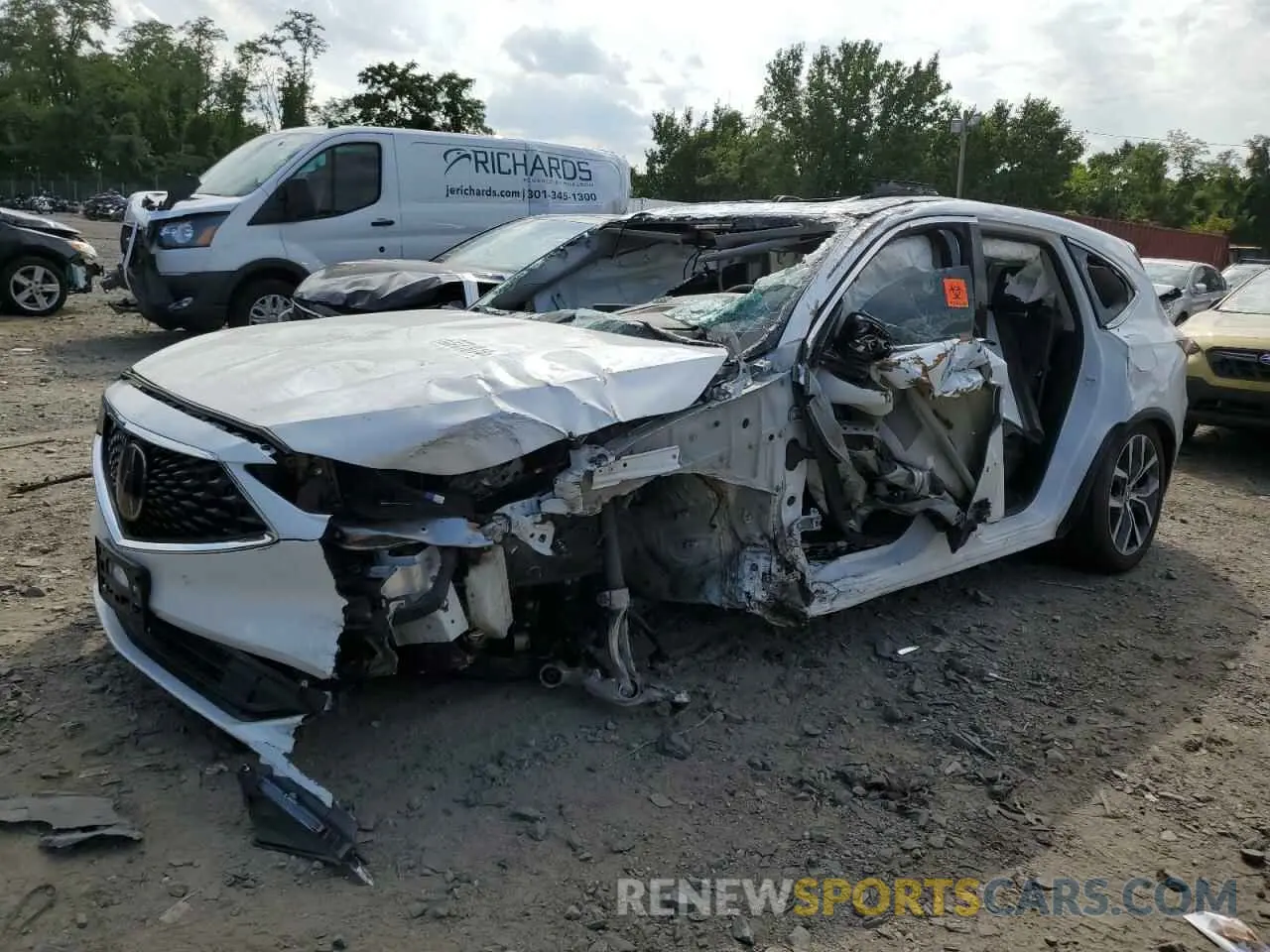 1 Photograph of a damaged car 5J8YE1H41PL032595 ACURA MDX 2023