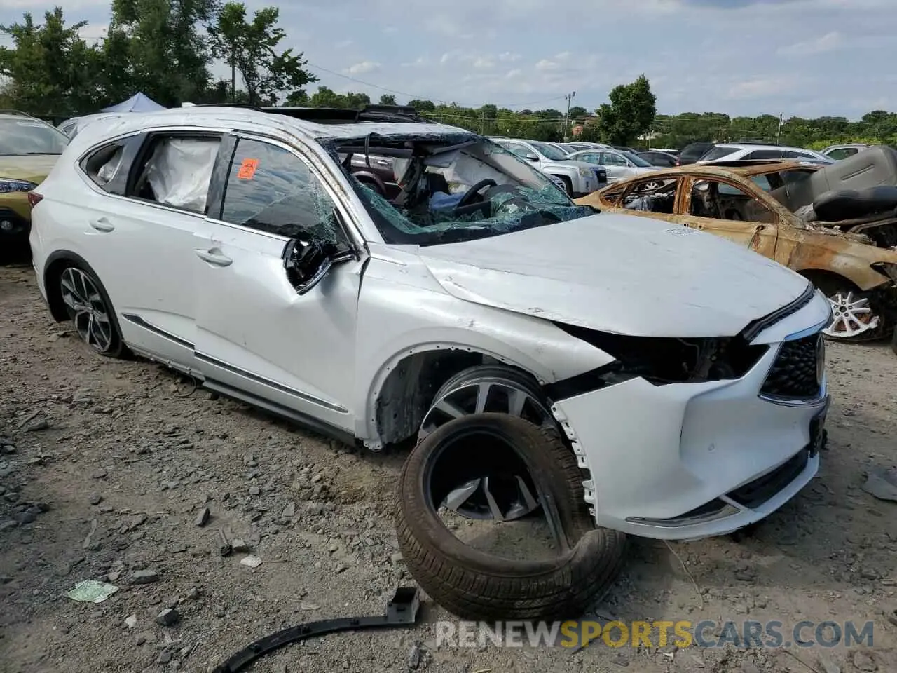 4 Photograph of a damaged car 5J8YE1H41PL032595 ACURA MDX 2023