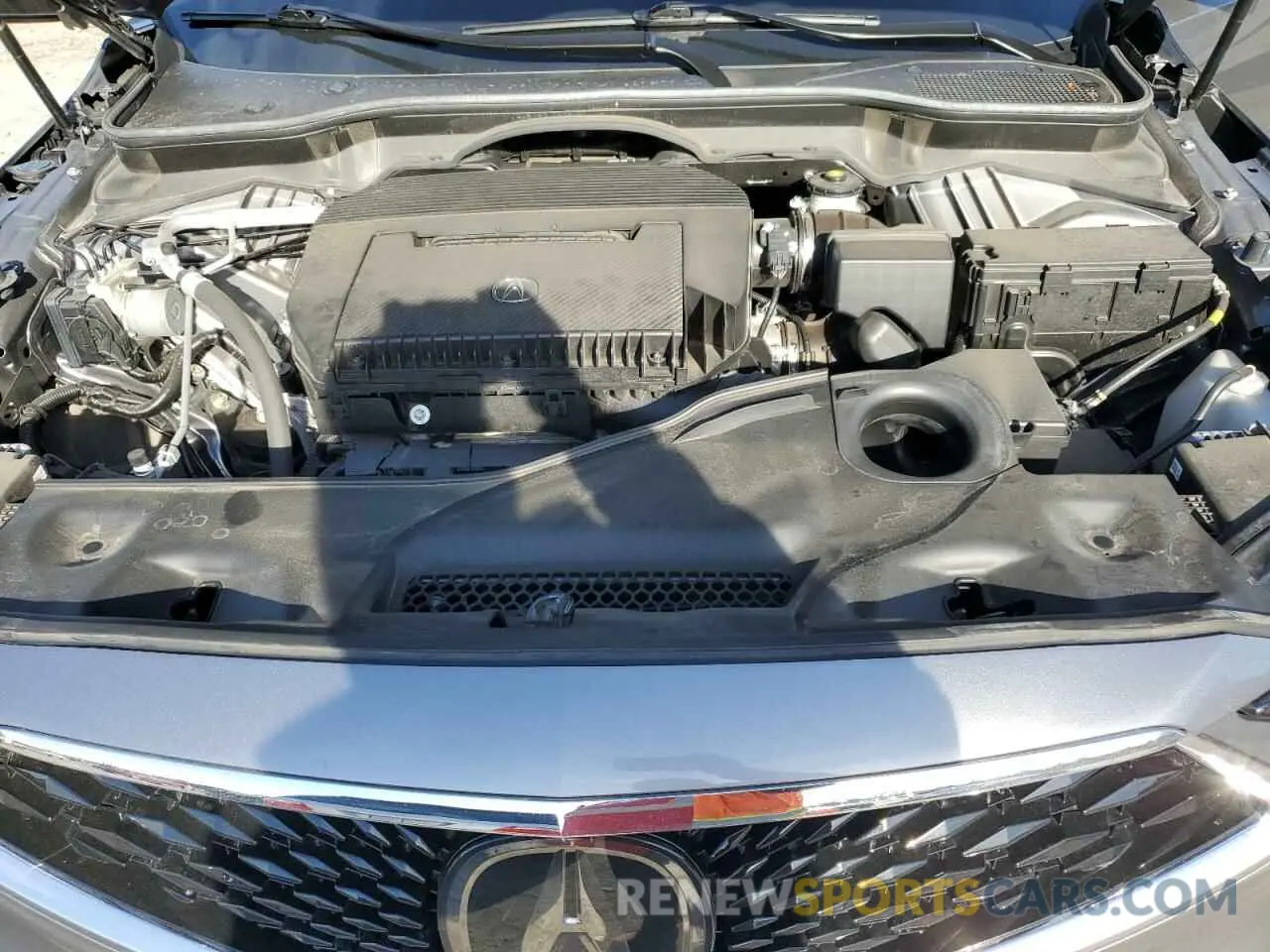 12 Photograph of a damaged car 5J8YE1H48PL028477 ACURA MDX 2023
