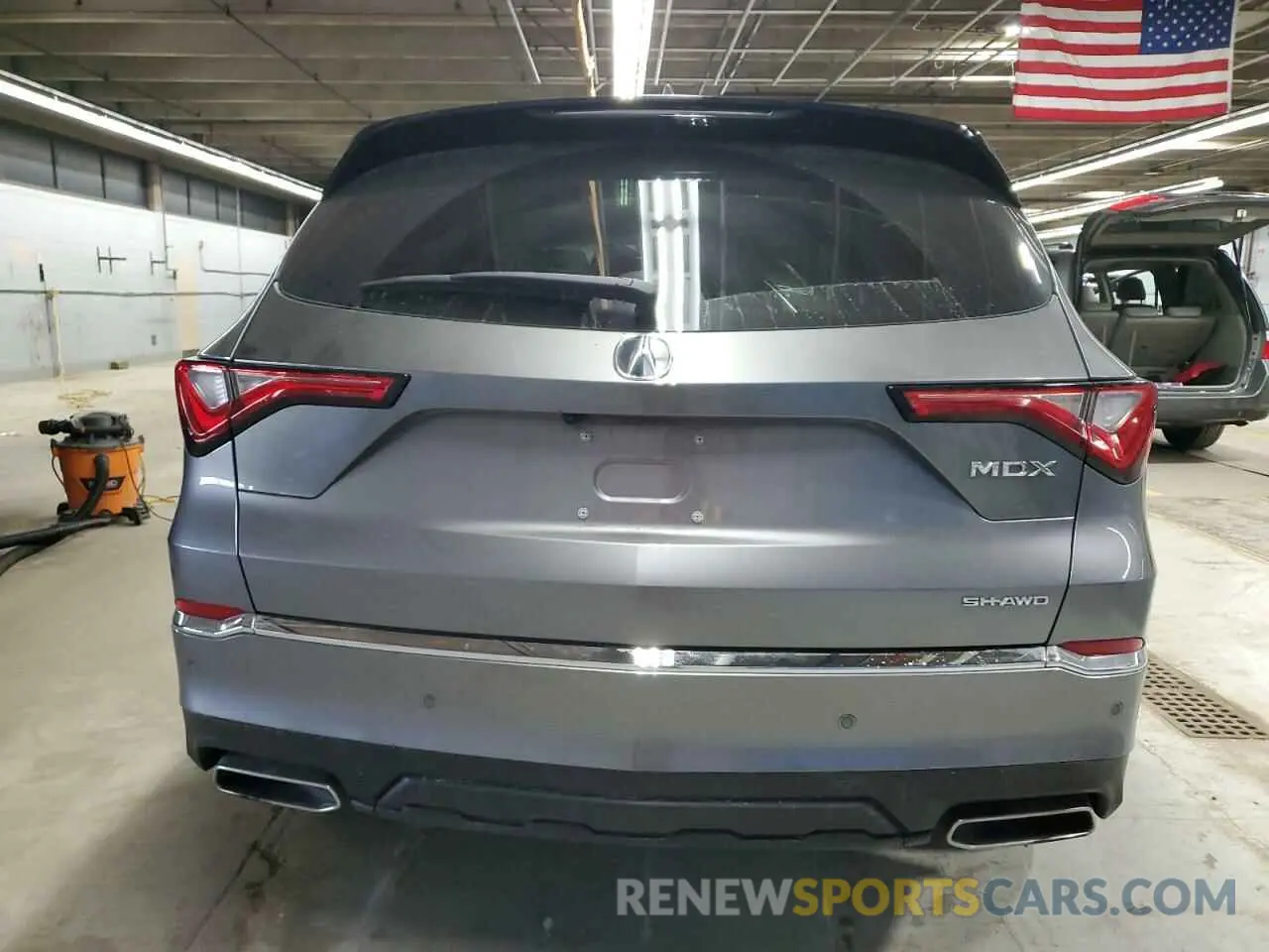 6 Photograph of a damaged car 5J8YE1H84PL024056 ACURA MDX 2023