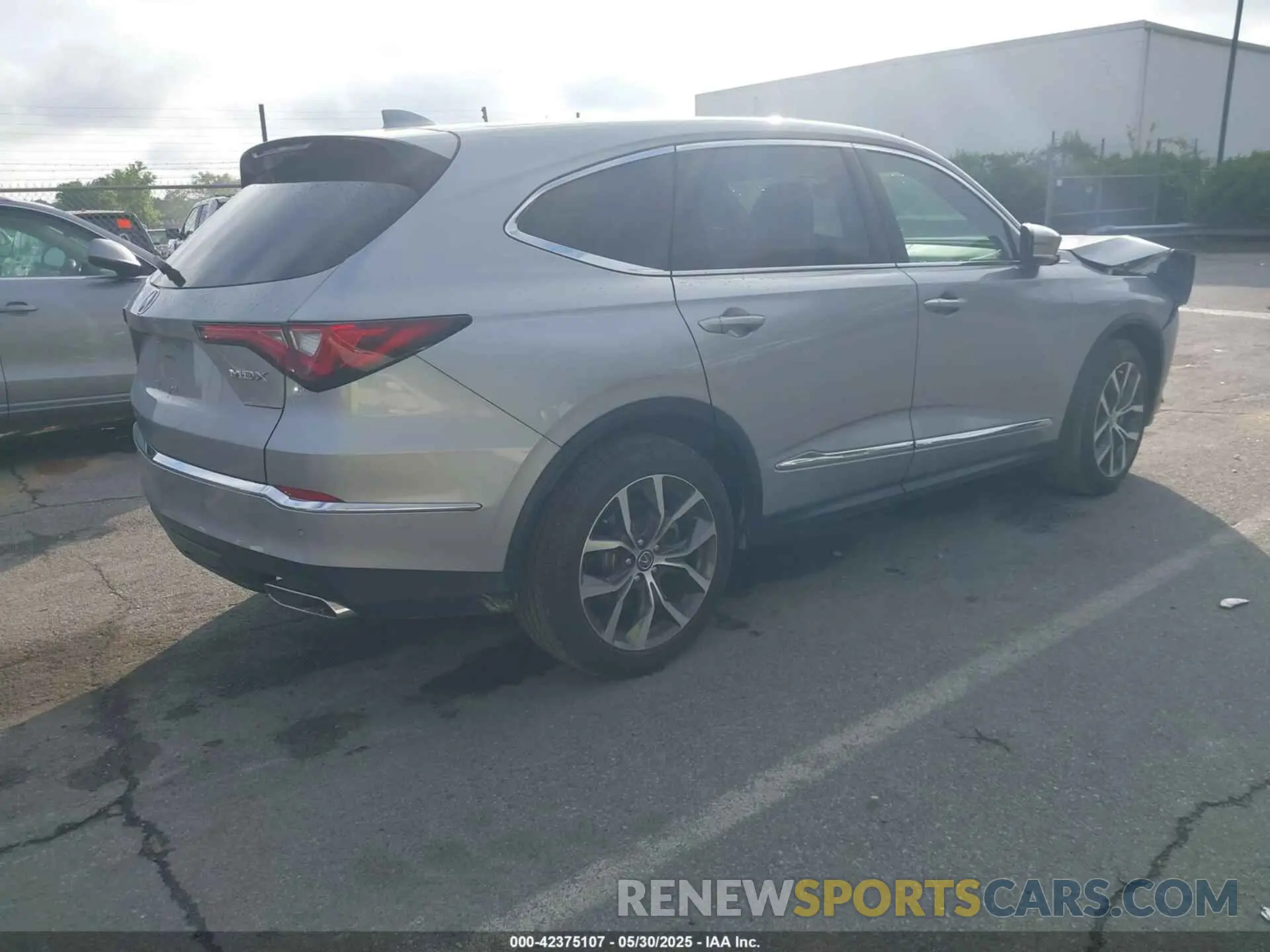 4 Photograph of a damaged car 5J8YD9H40RL007899 ACURA MDX 2024