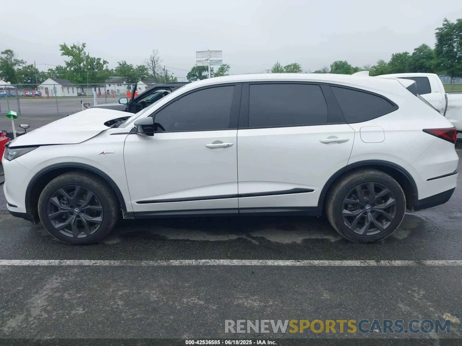 14 Photograph of a damaged car 5J8YE1H01RL005025 ACURA MDX 2024