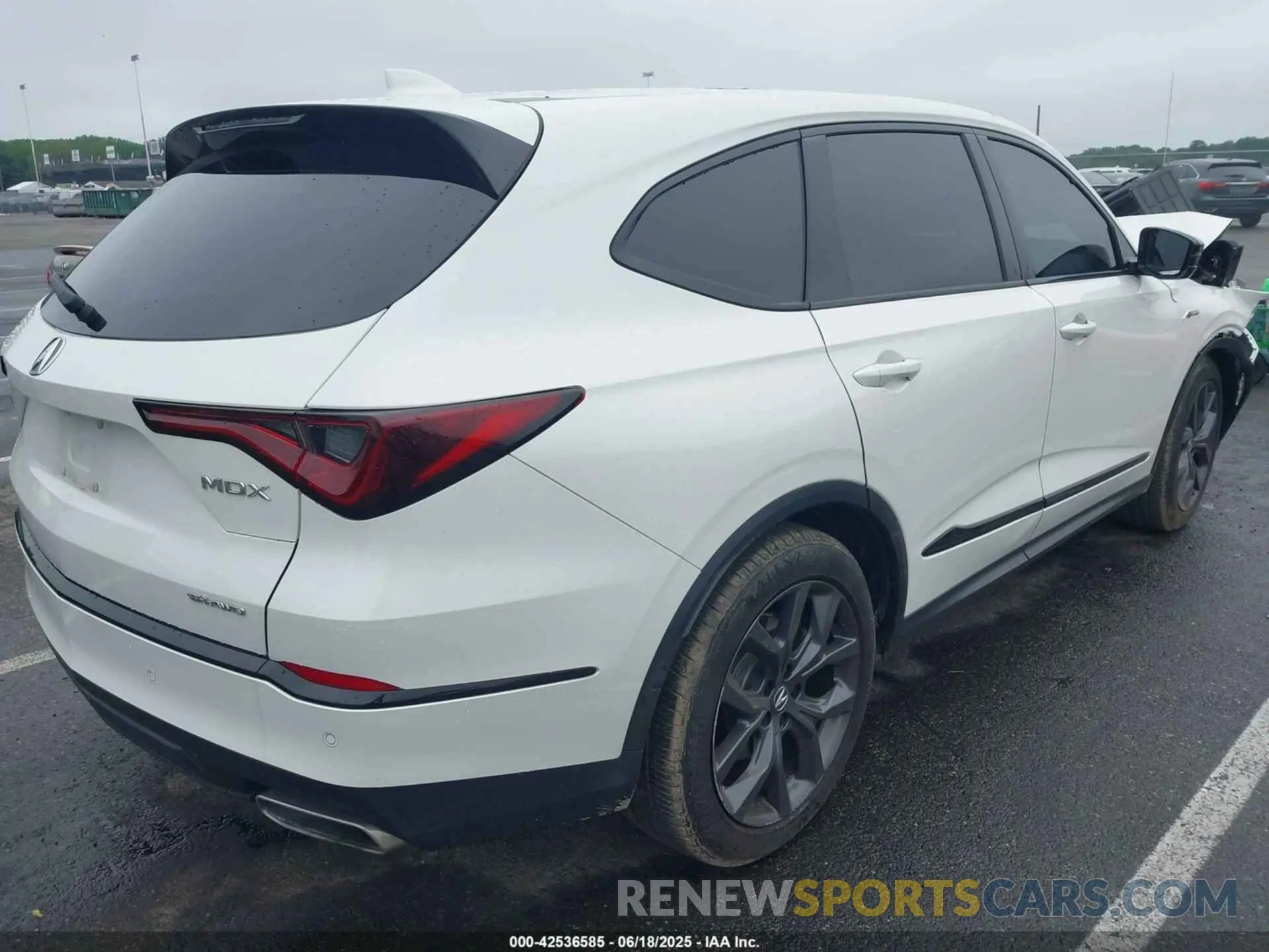 4 Photograph of a damaged car 5J8YE1H01RL005025 ACURA MDX 2024