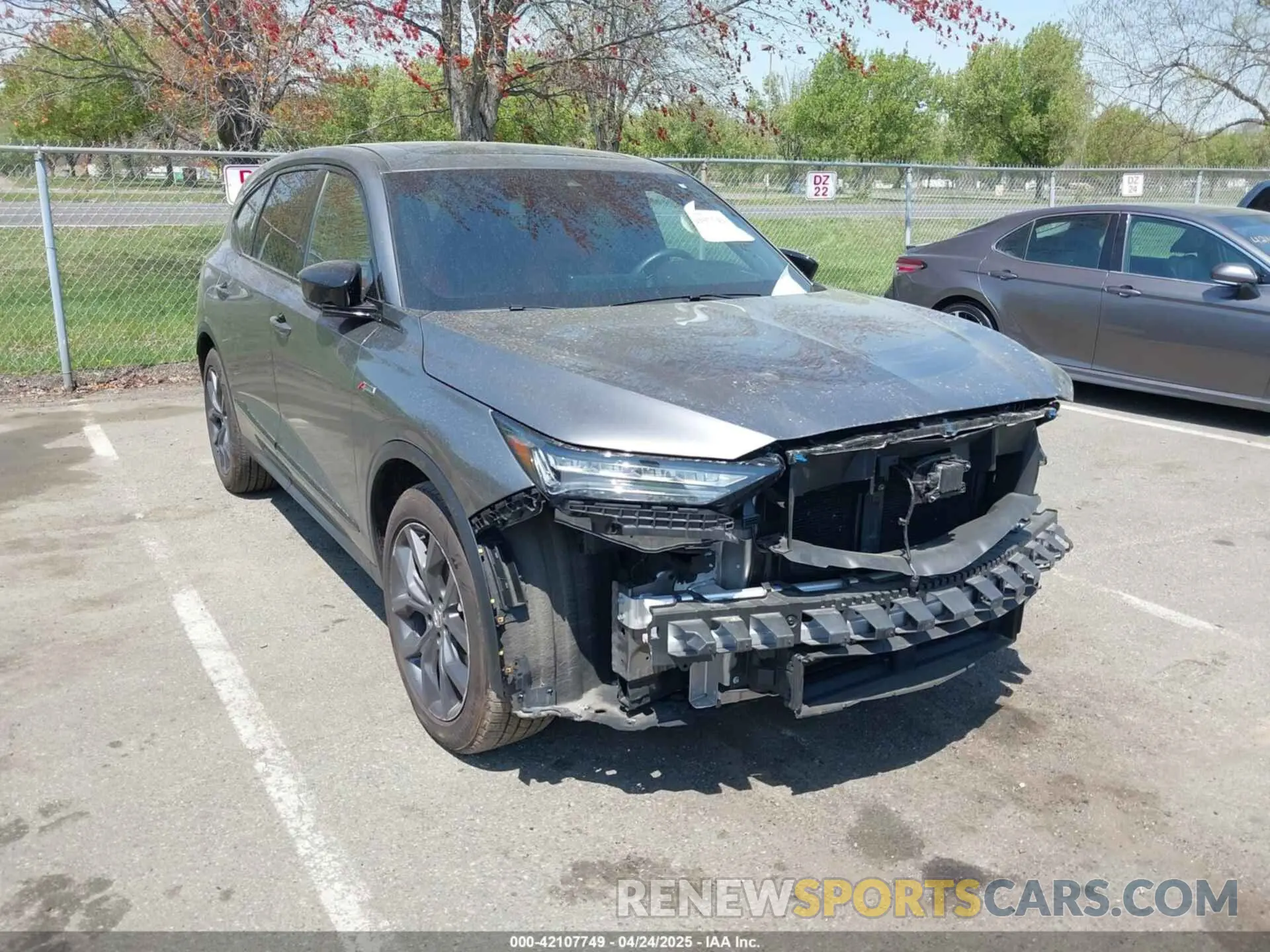 1 Photograph of a damaged car 5J8YE1H03RL020657 ACURA MDX 2024