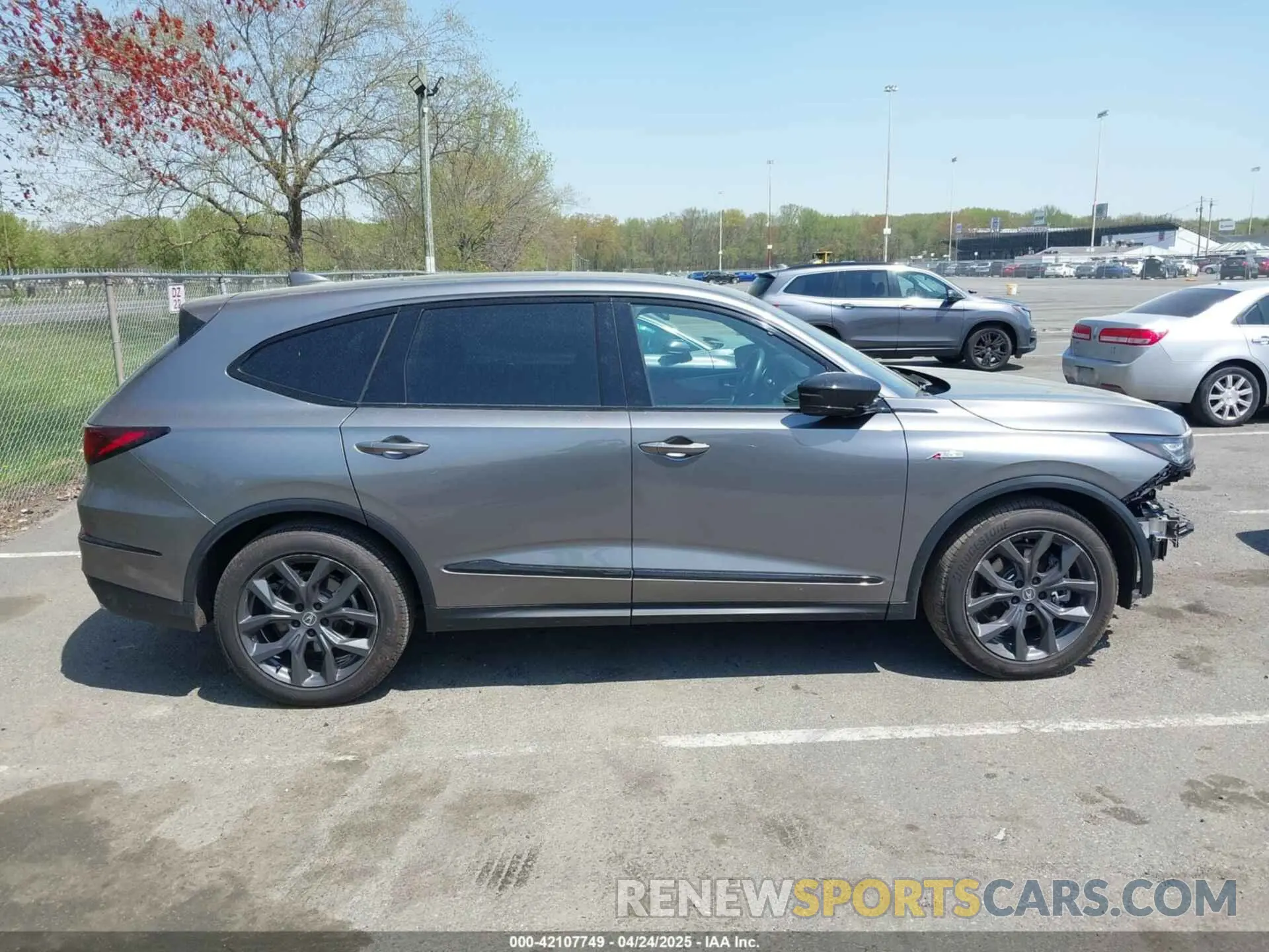 12 Photograph of a damaged car 5J8YE1H03RL020657 ACURA MDX 2024