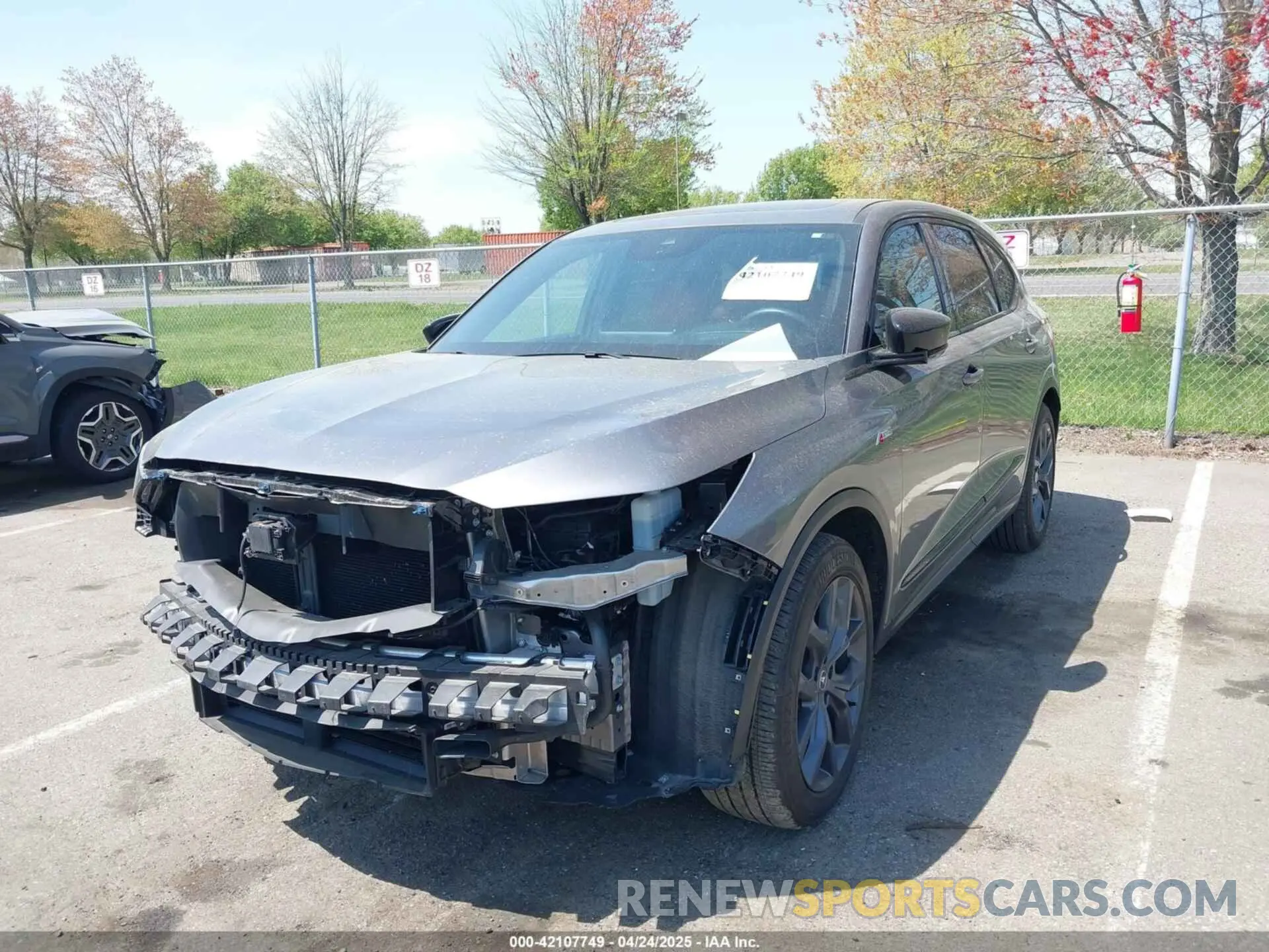 2 Photograph of a damaged car 5J8YE1H03RL020657 ACURA MDX 2024