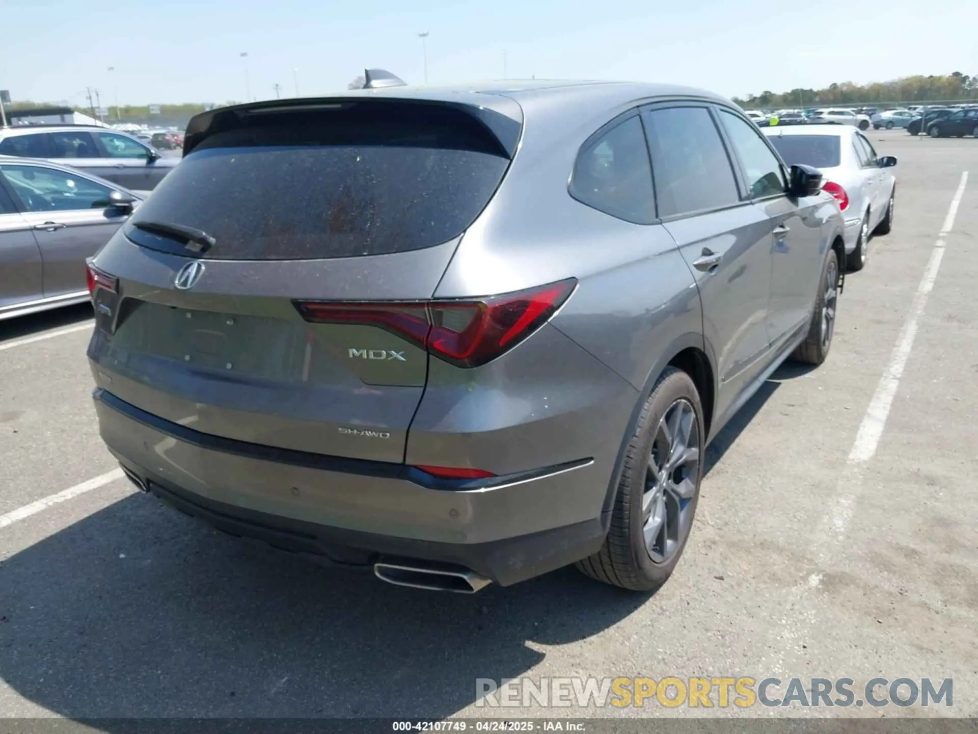 4 Photograph of a damaged car 5J8YE1H03RL020657 ACURA MDX 2024
