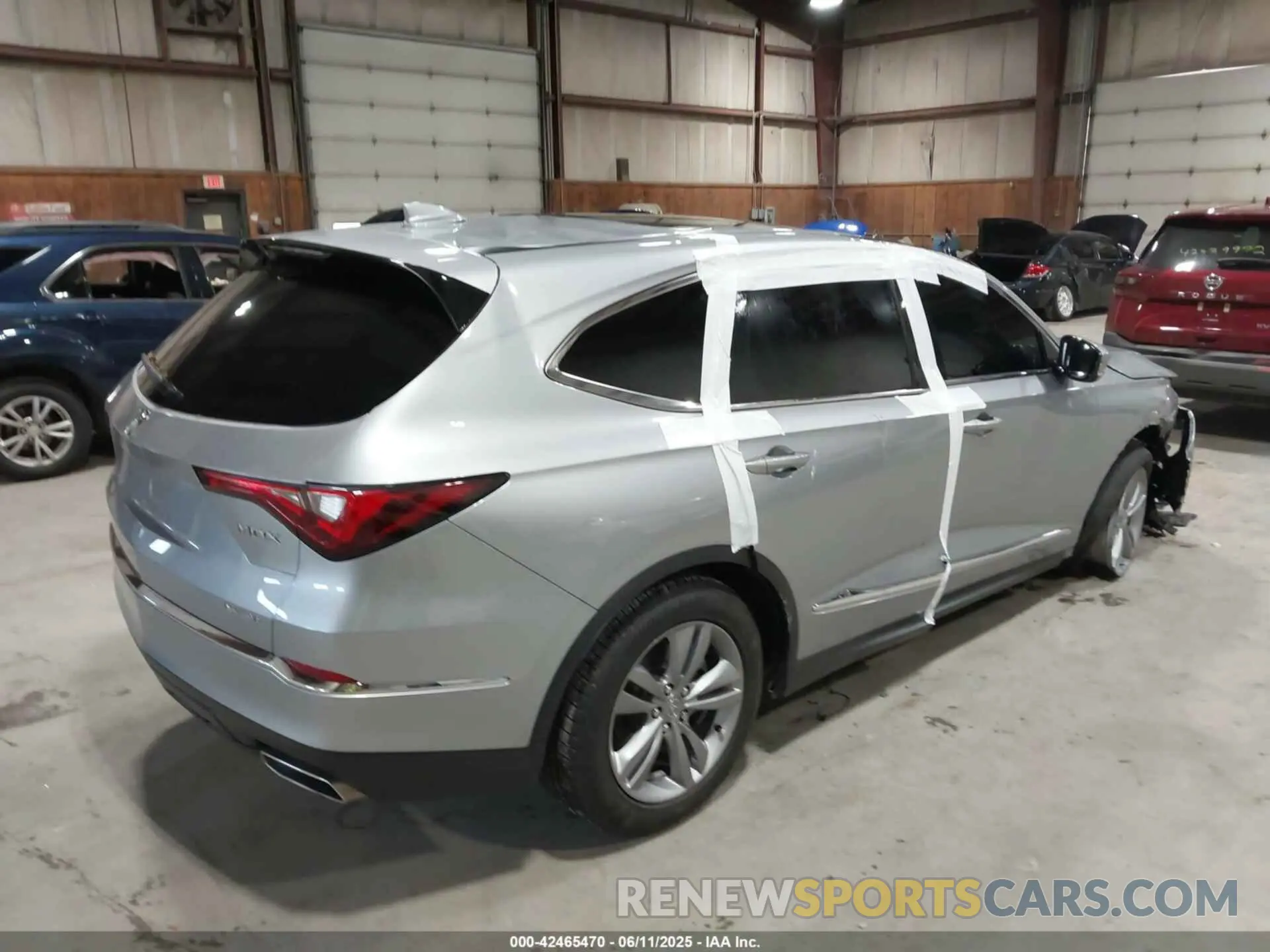4 Photograph of a damaged car 5J8YE1H33RL035282 ACURA MDX 2024