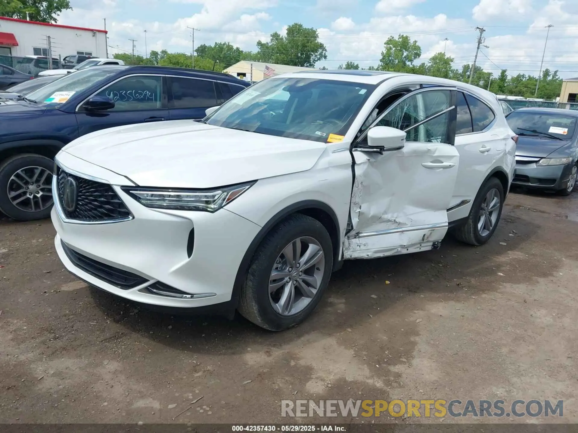 2 Photograph of a damaged car 5J8YE1H34RL032794 ACURA MDX 2024