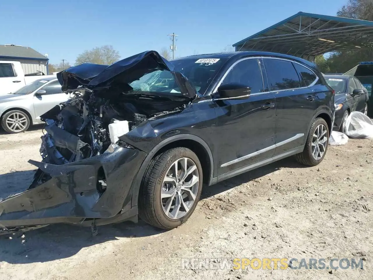 1 Photograph of a damaged car 5J8YE1H42RL023200 ACURA MDX 2024
