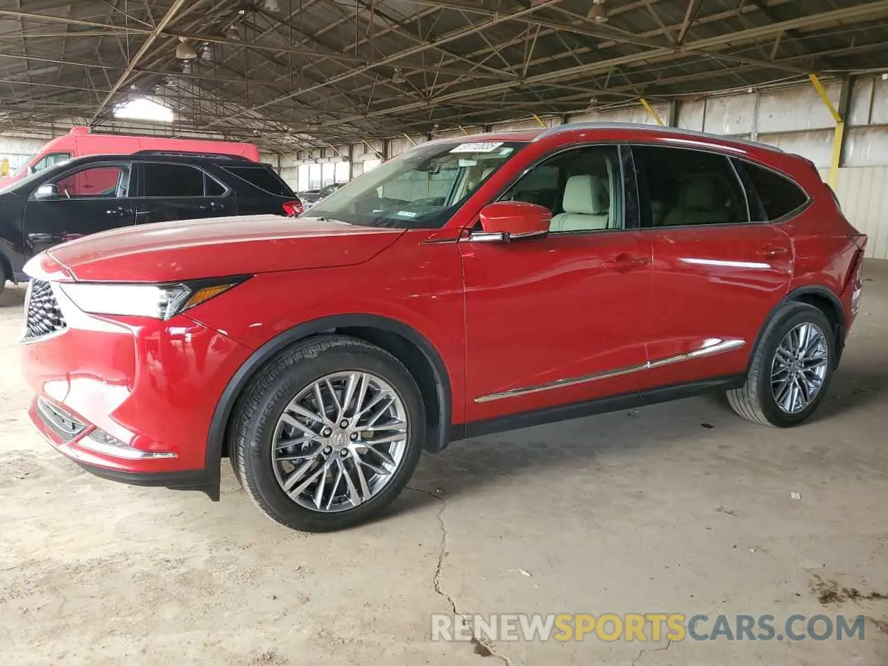 1 Photograph of a damaged car 5J8YE1H89RL017218 ACURA MDX 2024