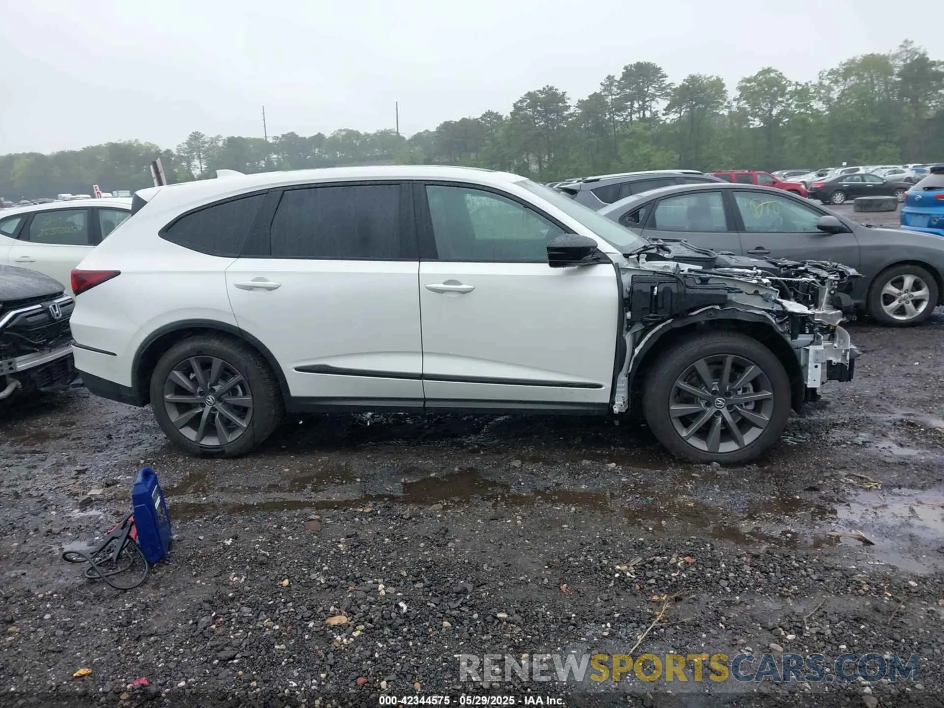 13 Photograph of a damaged car 5J8YE1H00SL019228 ACURA MDX 2025