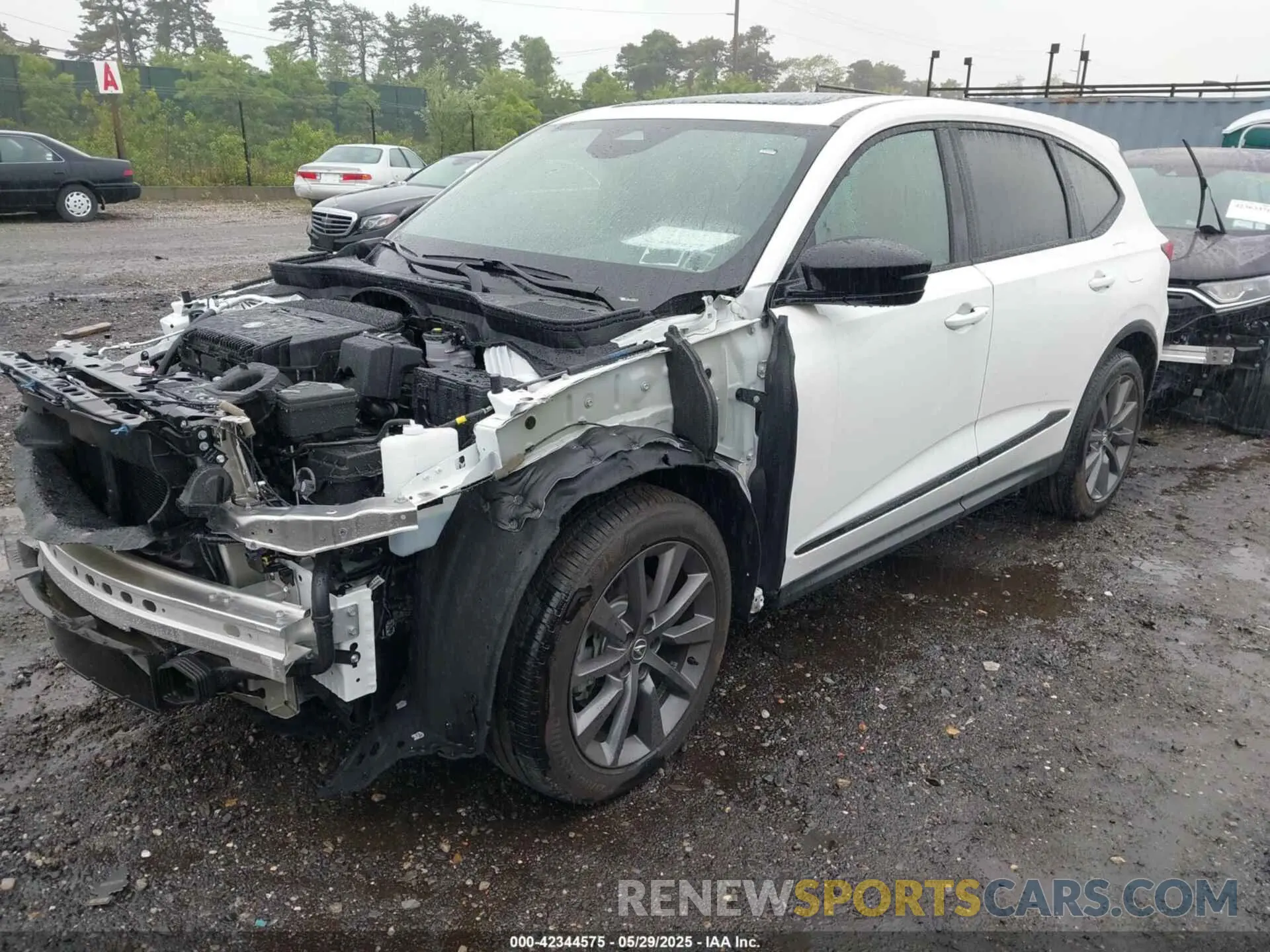 2 Photograph of a damaged car 5J8YE1H00SL019228 ACURA MDX 2025