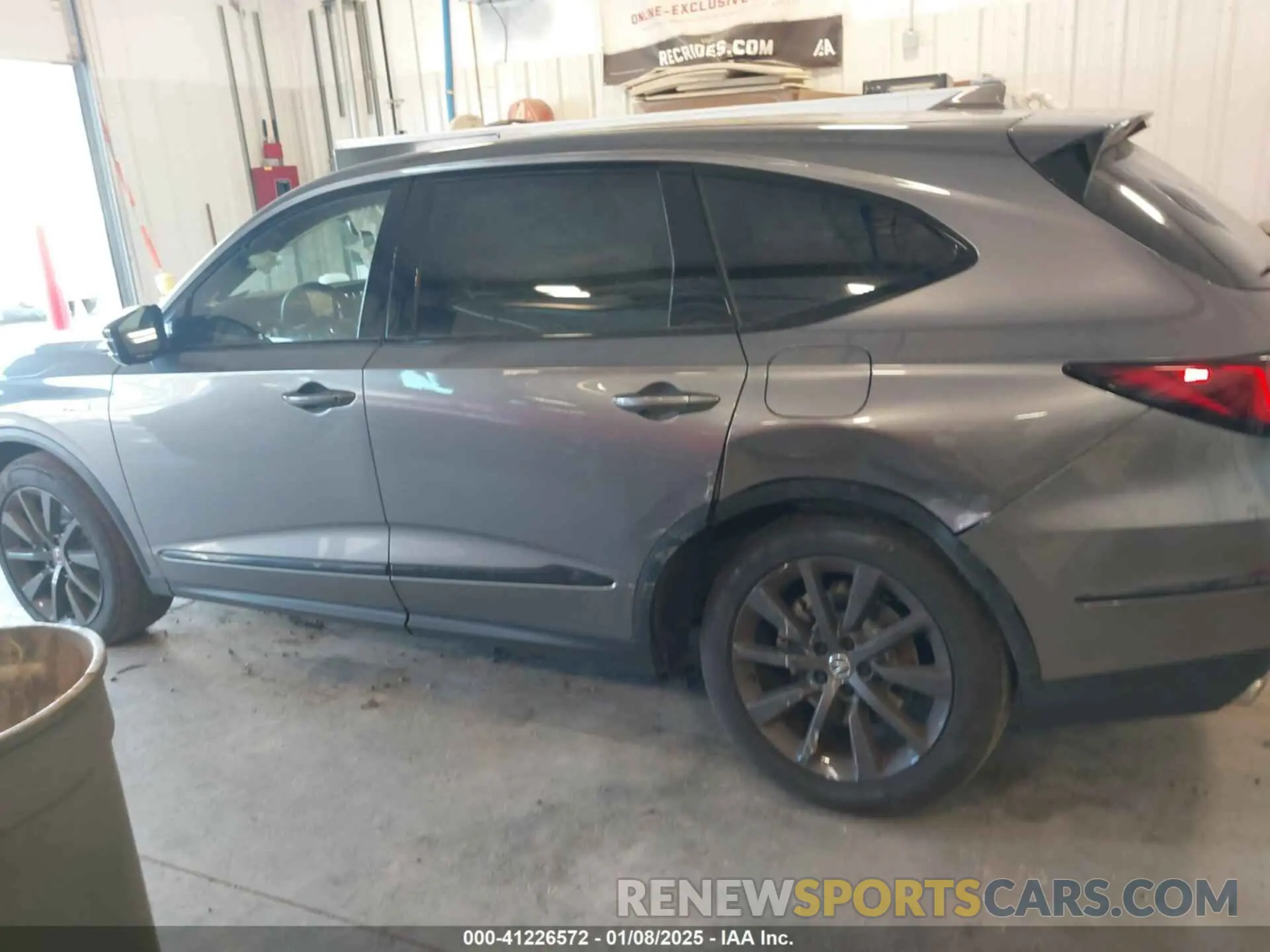 14 Photograph of a damaged car 5J8YE1H05SL003218 ACURA MDX 2025
