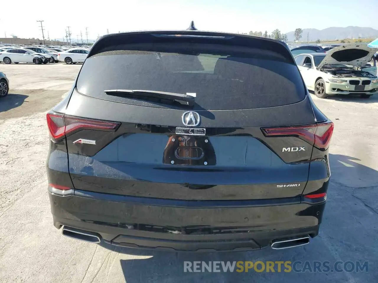 6 Photograph of a damaged car 5J8YE1H06SL010596 ACURA MDX 2025