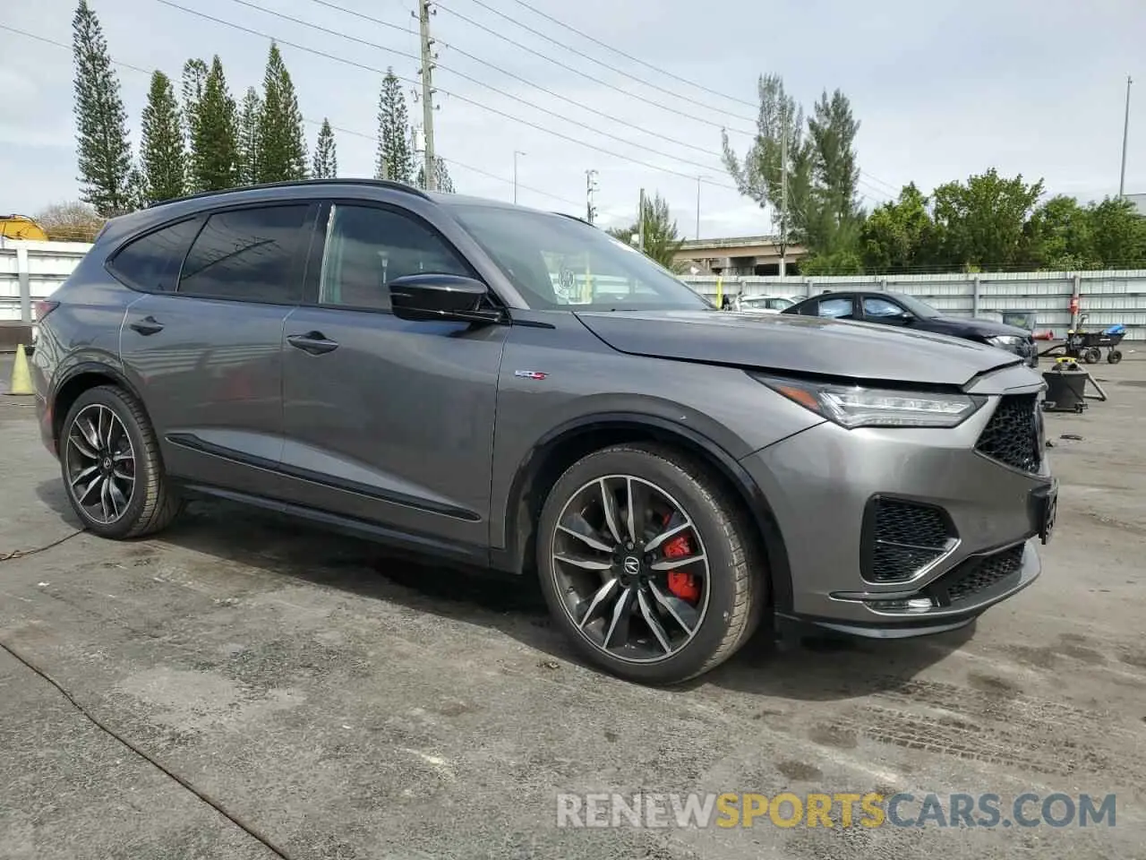 4 Photograph of a damaged car 5J8YD8H86NL000916 ACURA MDX TYPE S 2022