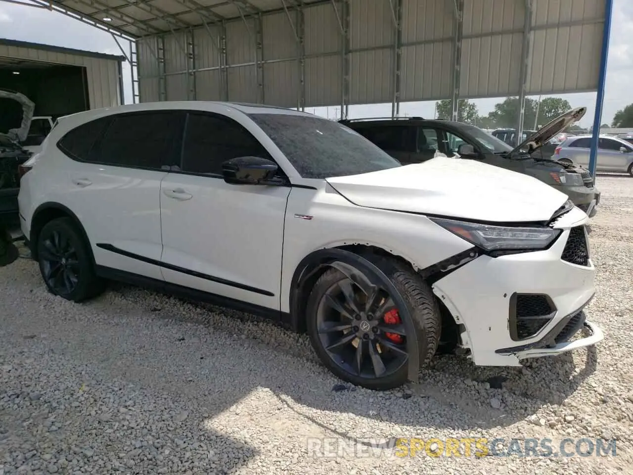 4 Photograph of a damaged car 5J8YD8H99NL003432 ACURA MDX TYPE S 2022