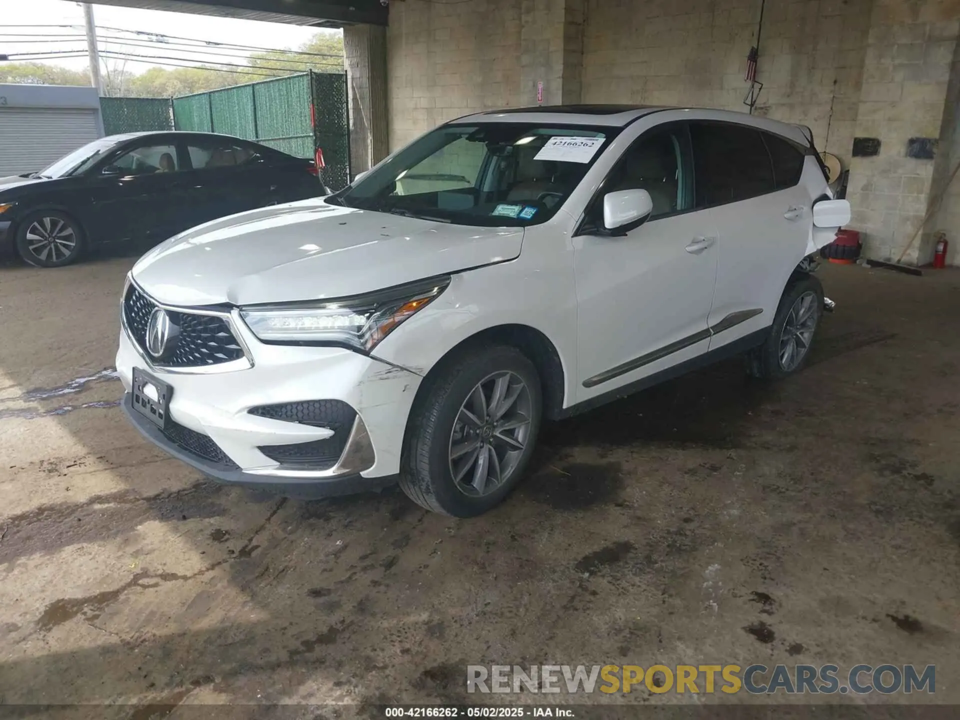 2 Photograph of a damaged car 5J8TC2H5XLL011379 ACURA RDX 2020