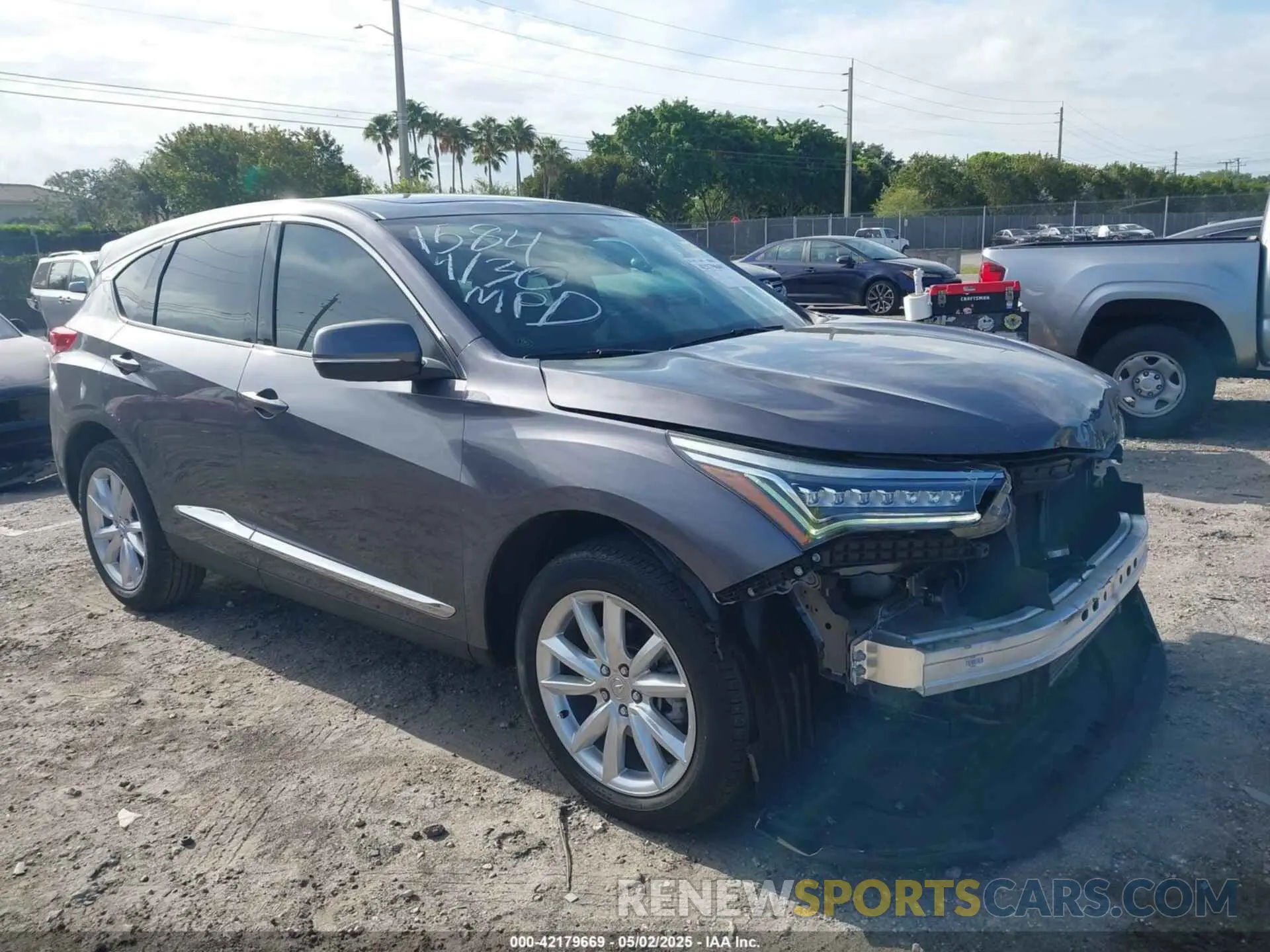 1 Photograph of a damaged car 5J8TC1H32ML001584 ACURA RDX 2021