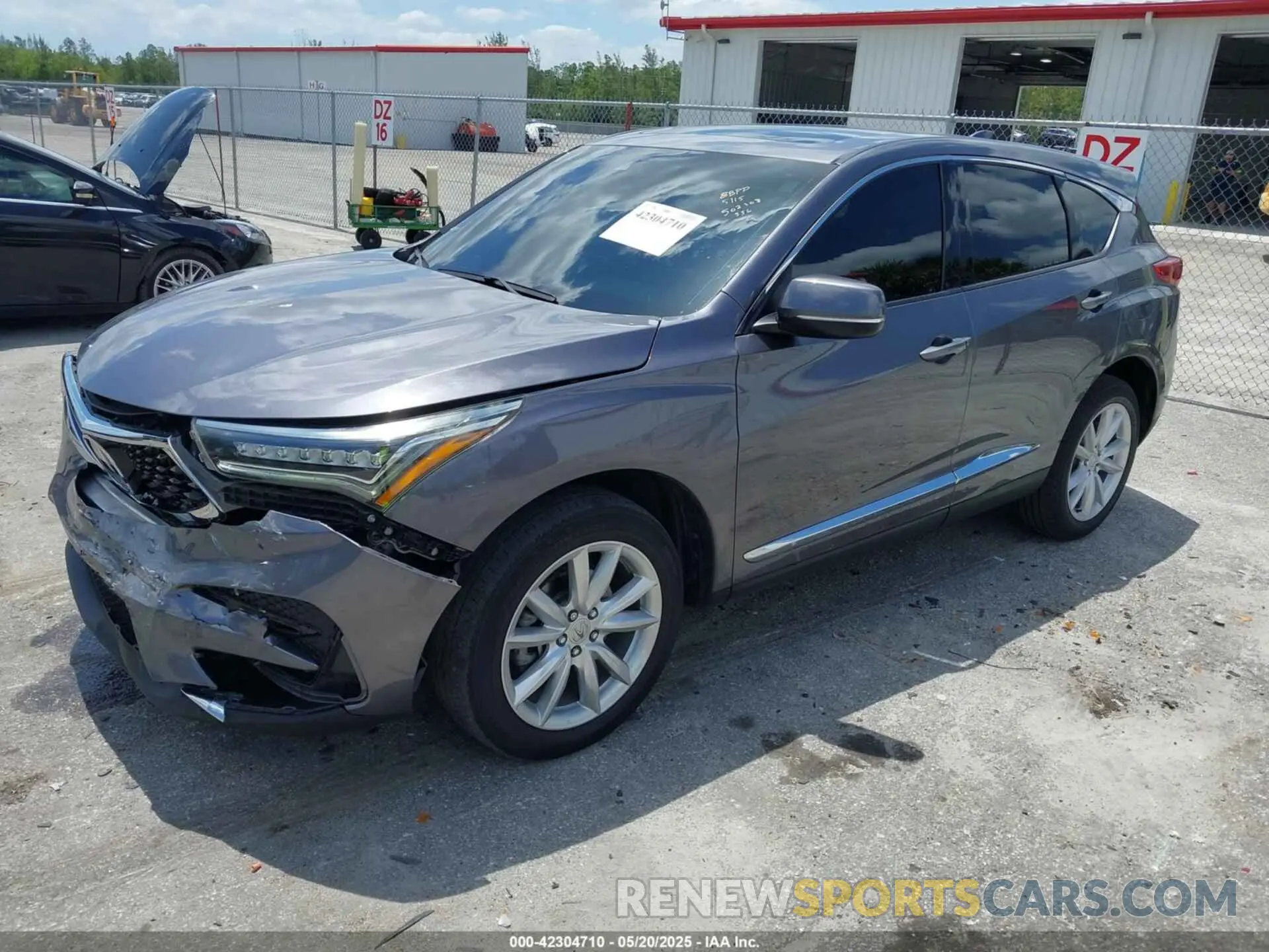 2 Photograph of a damaged car 5J8TC1H33ML016658 ACURA RDX 2021