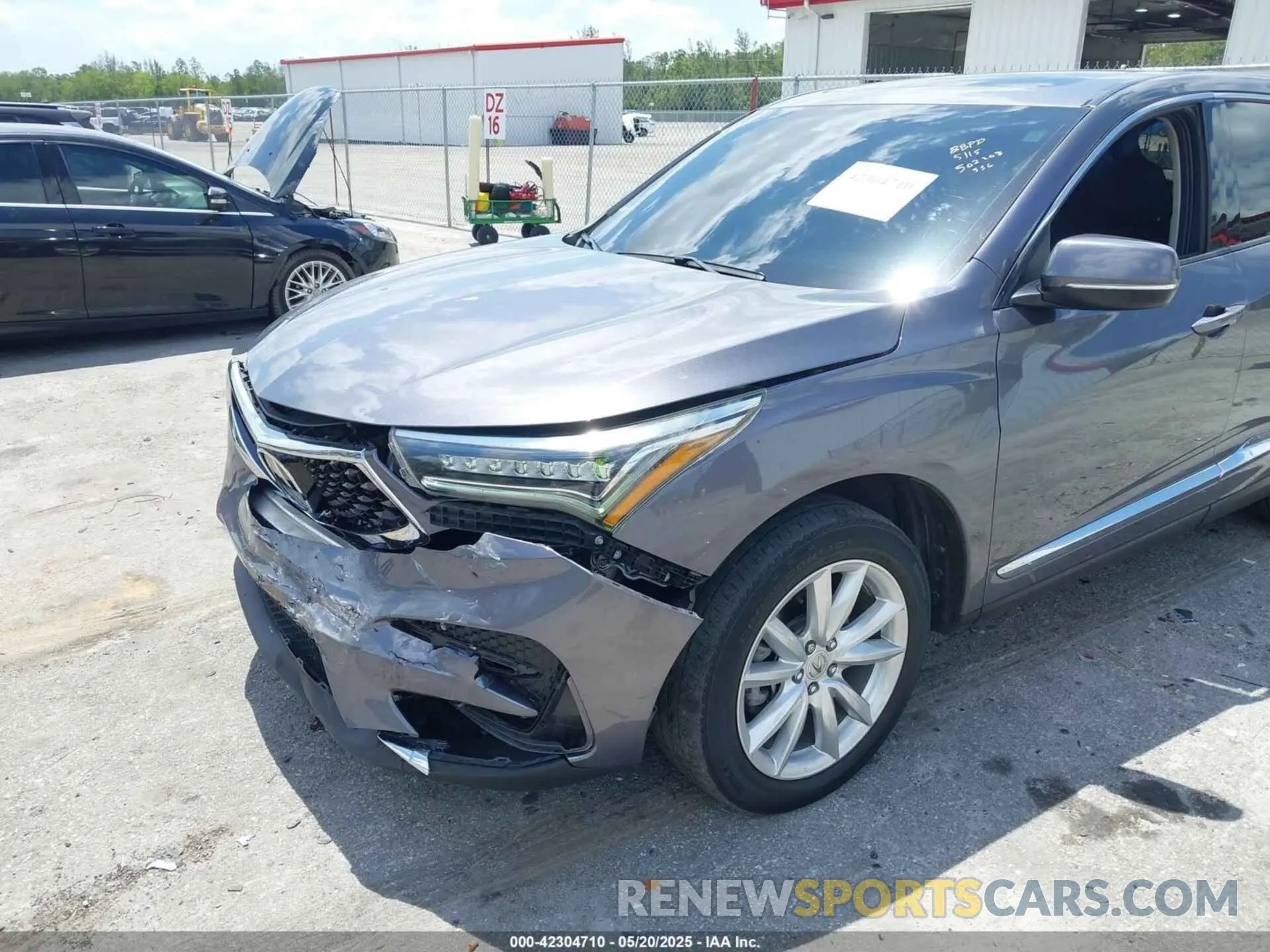 6 Photograph of a damaged car 5J8TC1H33ML016658 ACURA RDX 2021