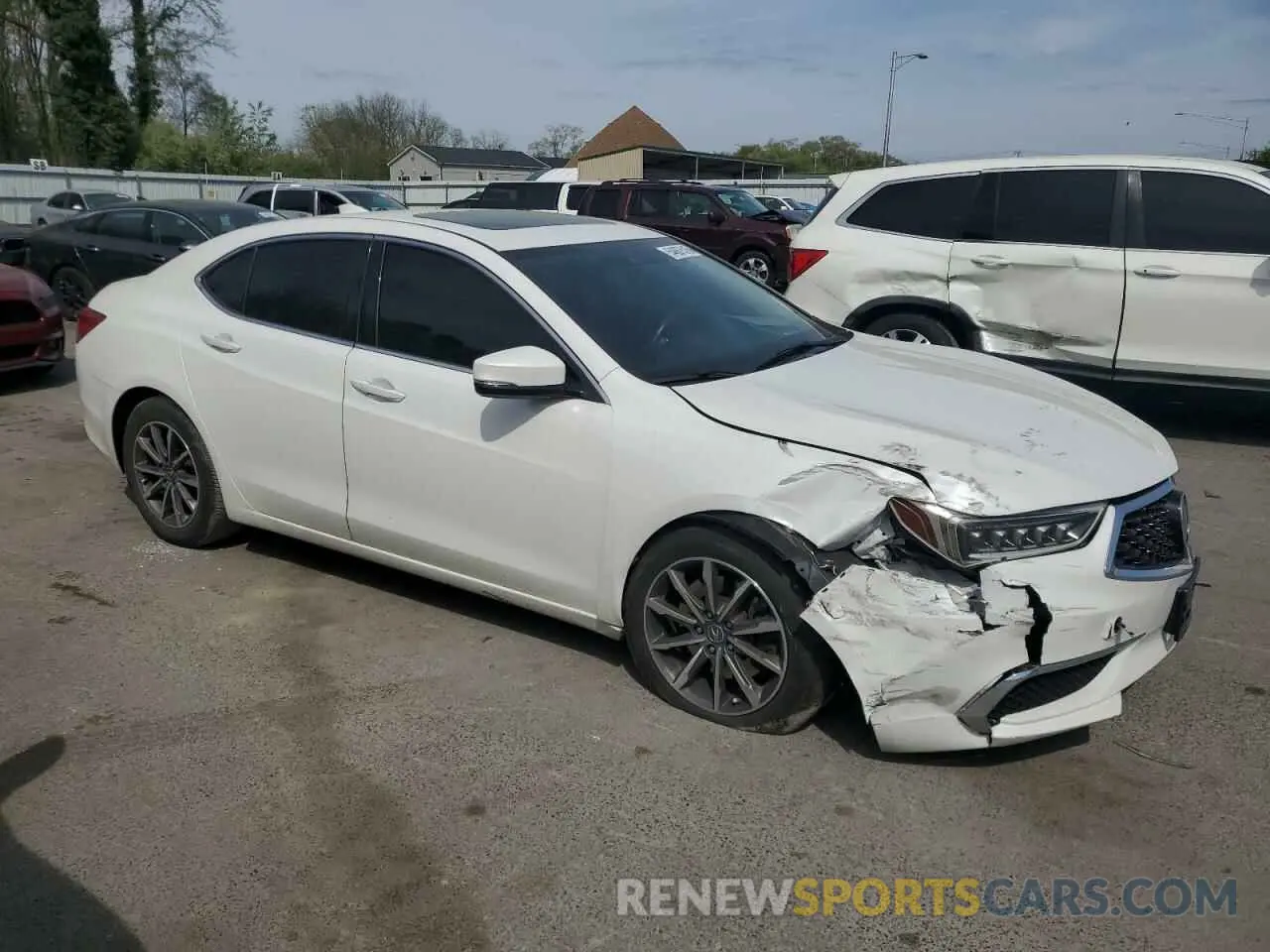4 Photograph of a damaged car 19UUB1F33KA007915 ACURA TLX 2019
