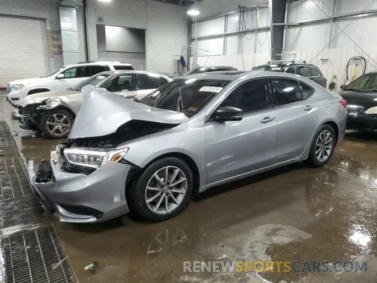 1 Photograph of a damaged car 19UUB1F33KA009700 ACURA TLX 2019