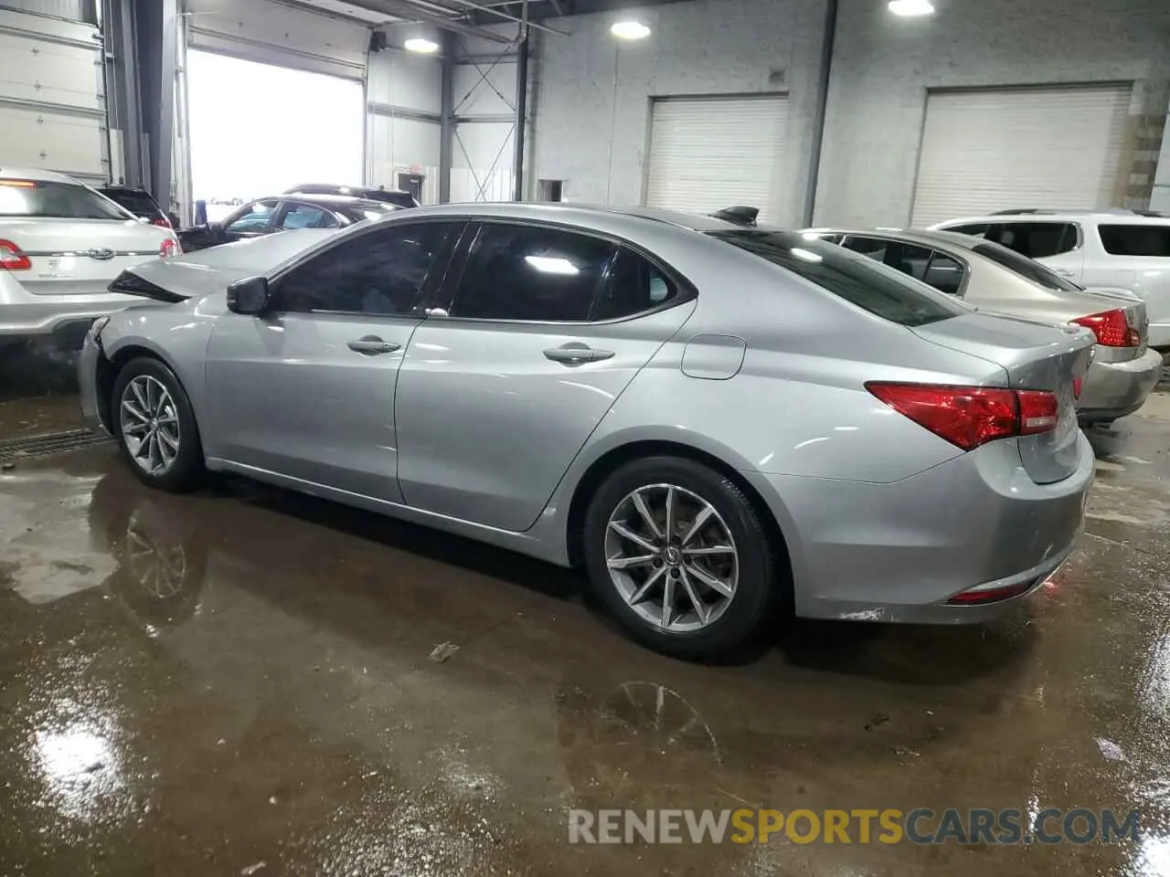 2 Photograph of a damaged car 19UUB1F33KA009700 ACURA TLX 2019
