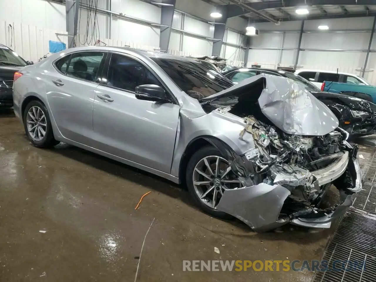 4 Photograph of a damaged car 19UUB1F33KA009700 ACURA TLX 2019