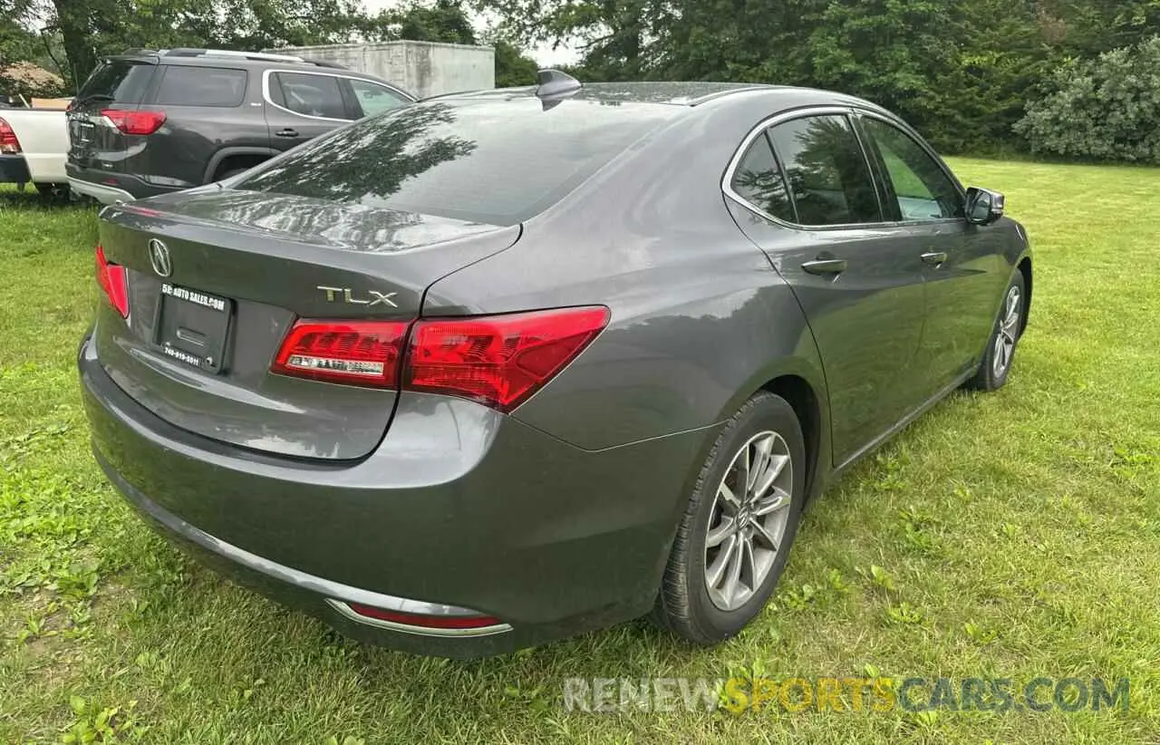 4 Photograph of a damaged car 19UUB1F35KA007799 ACURA TLX 2019