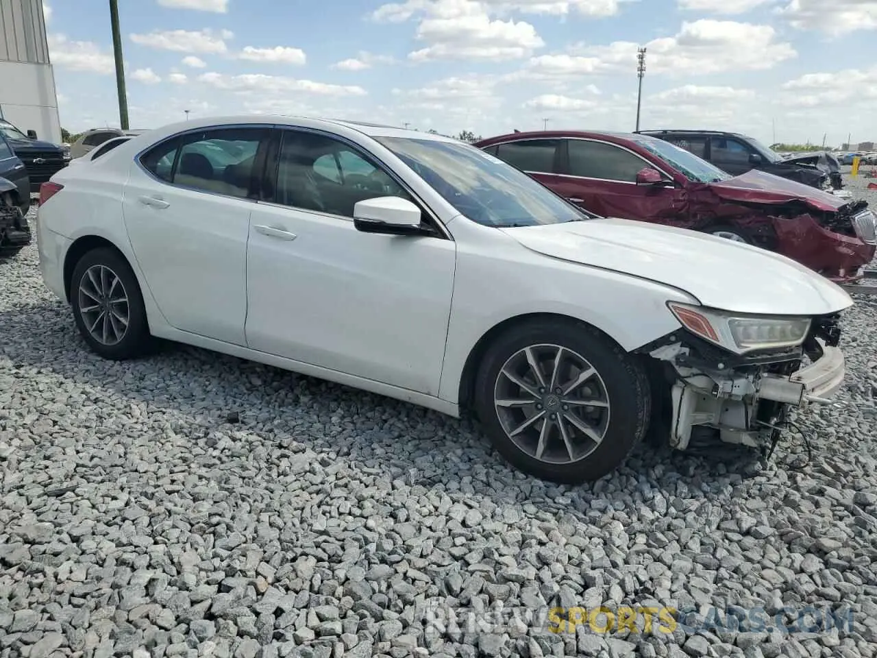 4 Photograph of a damaged car 19UUB1F38KA011085 ACURA TLX 2019