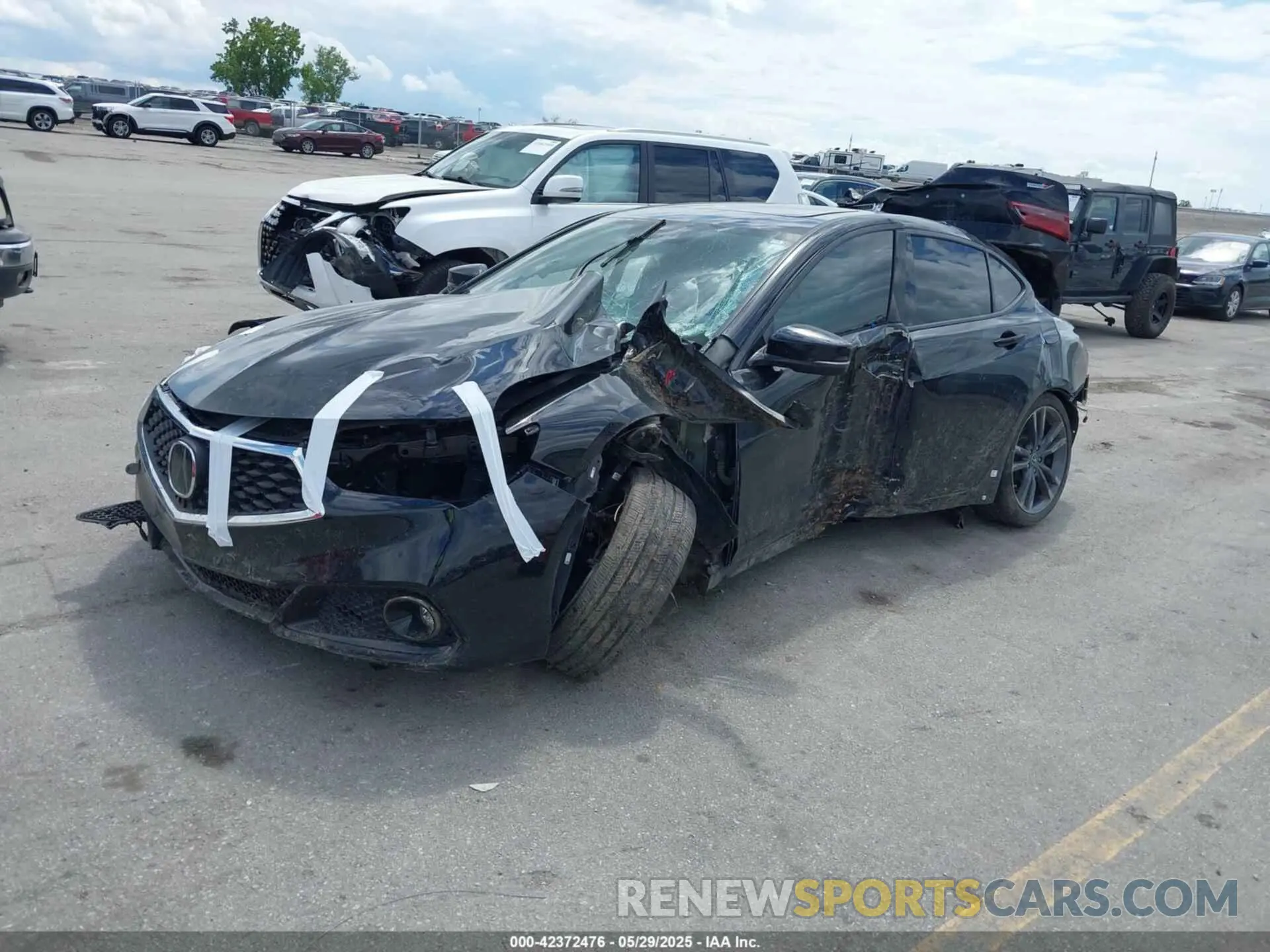 2 Photograph of a damaged car 19UUB1F62KA001601 ACURA TLX 2019