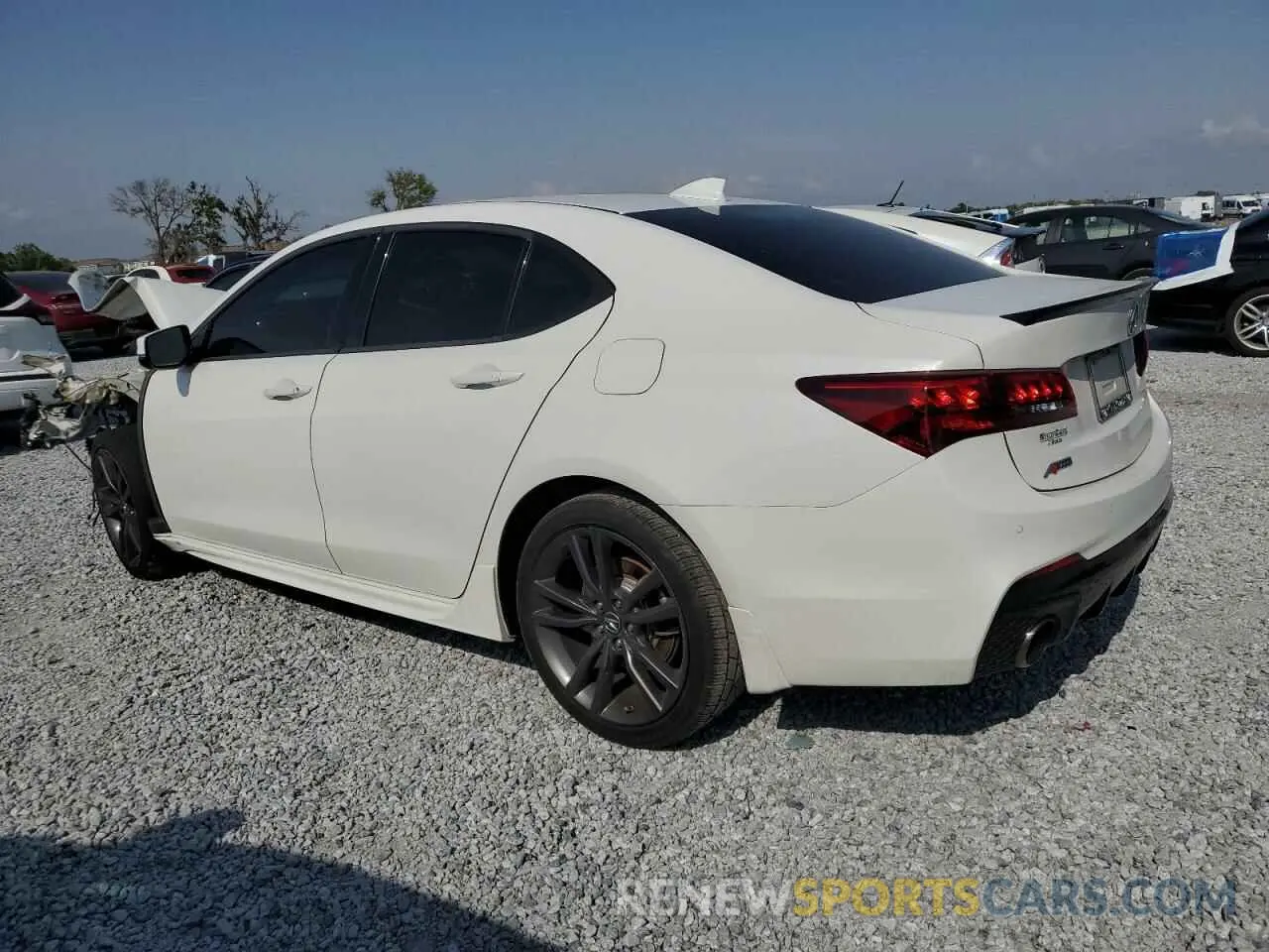 2 Photograph of a damaged car 19UUB1F63KA003938 ACURA TLX 2019