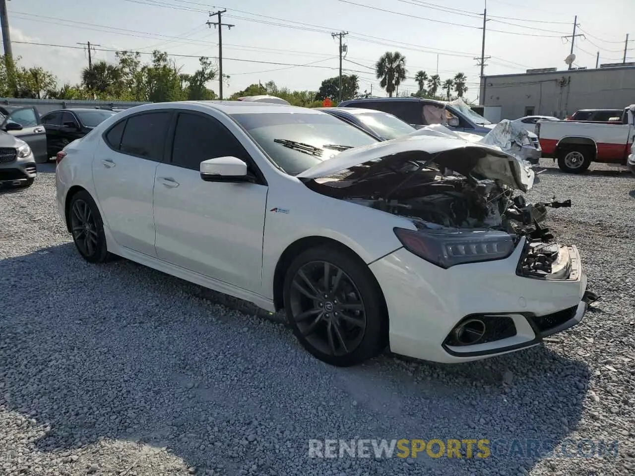 4 Photograph of a damaged car 19UUB1F63KA003938 ACURA TLX 2019
