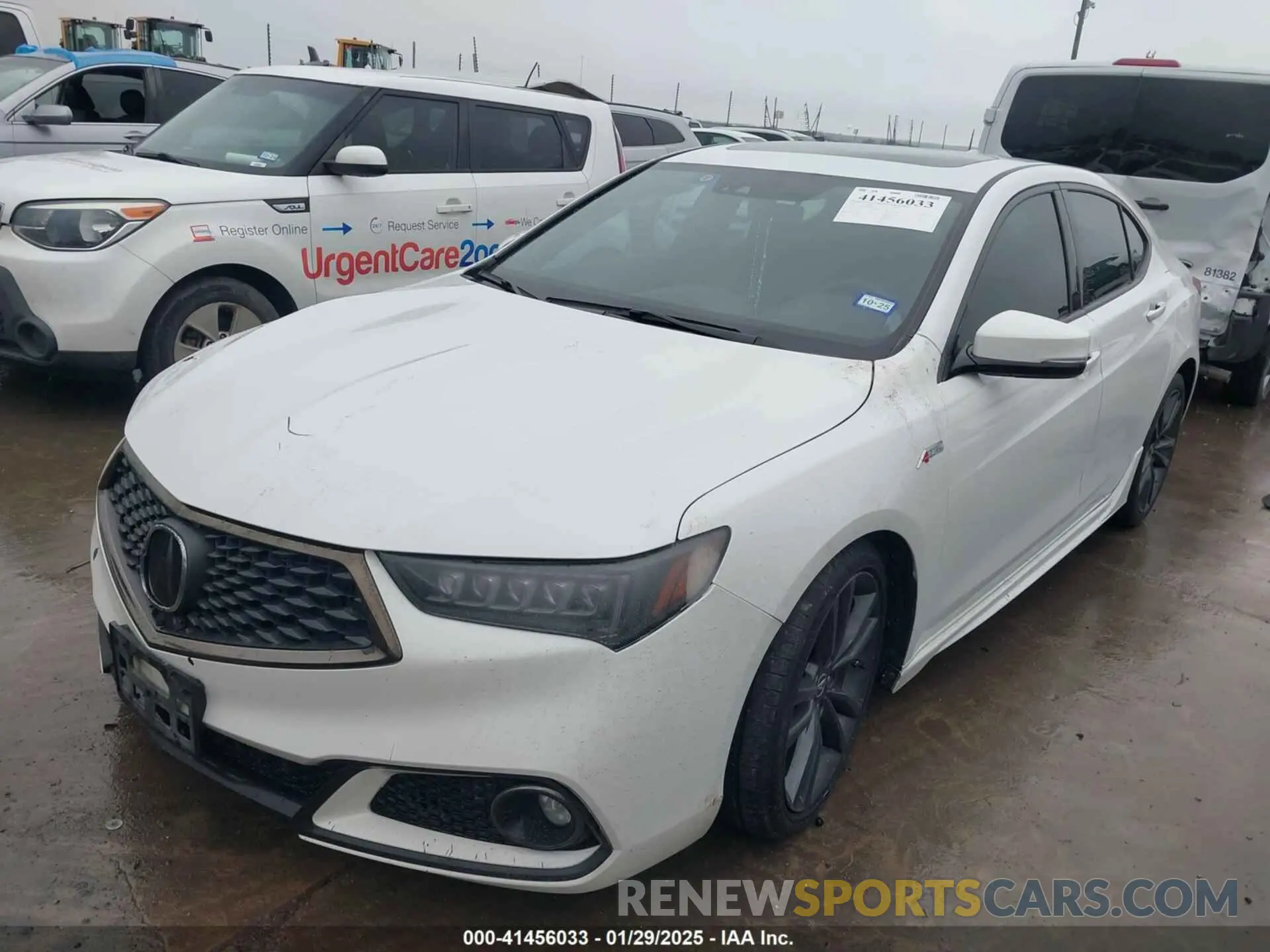 2 Photograph of a damaged car 19UUB1F63KA009058 ACURA TLX 2019