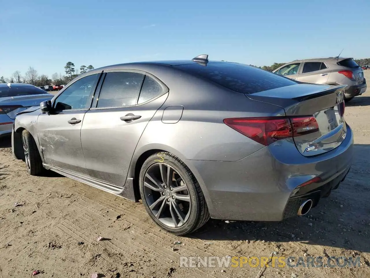 2 Photograph of a damaged car 19UUB1F64KA003687 ACURA TLX 2019