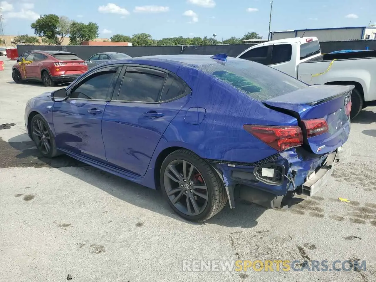 2 Photograph of a damaged car 19UUB1F68KA003322 ACURA TLX 2019