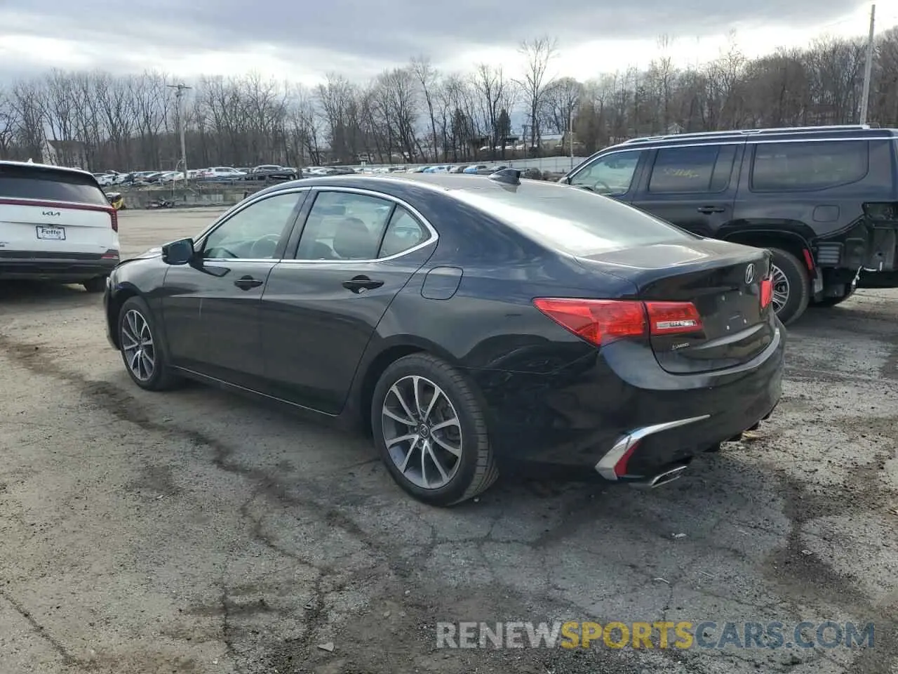 2 Photograph of a damaged car 19UUB2F38KA005759 ACURA TLX 2019