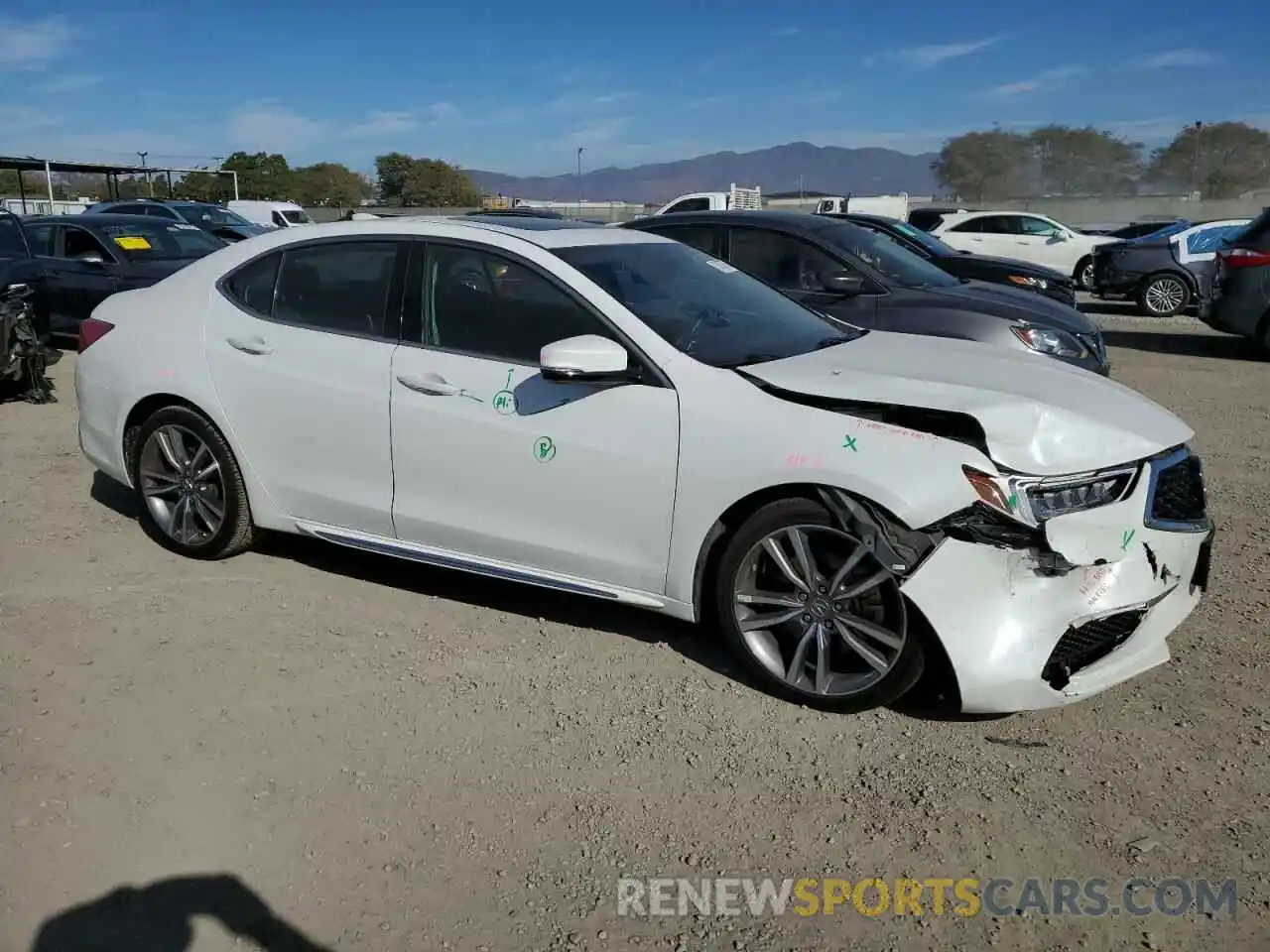 4 Photograph of a damaged car 19UUB2F41KA001853 ACURA TLX 2019