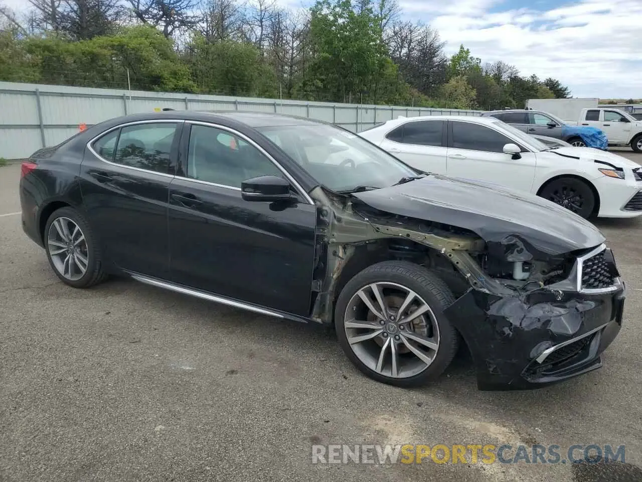 4 Photograph of a damaged car 19UUB2F41KA004221 ACURA TLX 2019