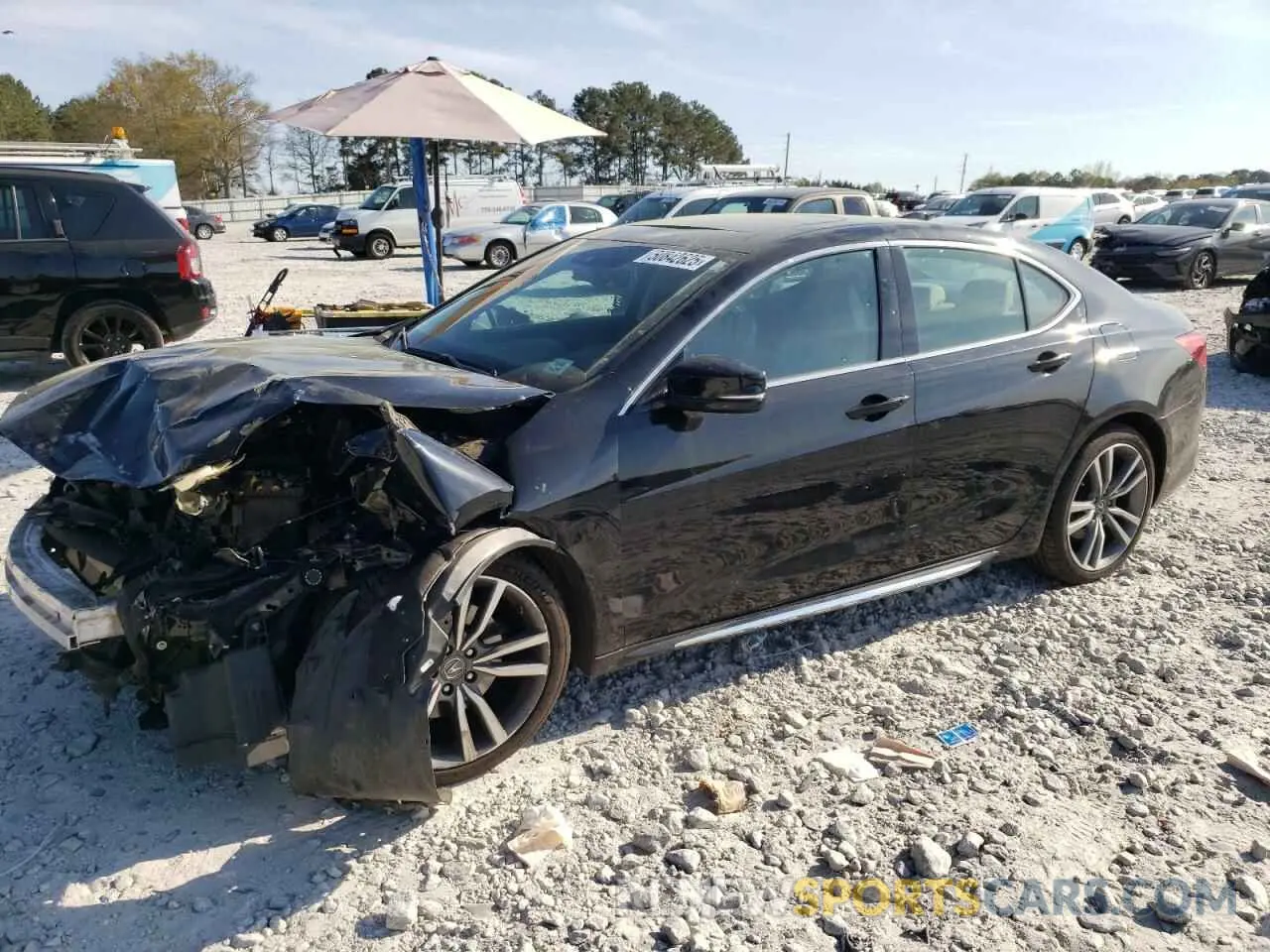 1 Photograph of a damaged car 19UUB2F41KA008088 ACURA TLX 2019