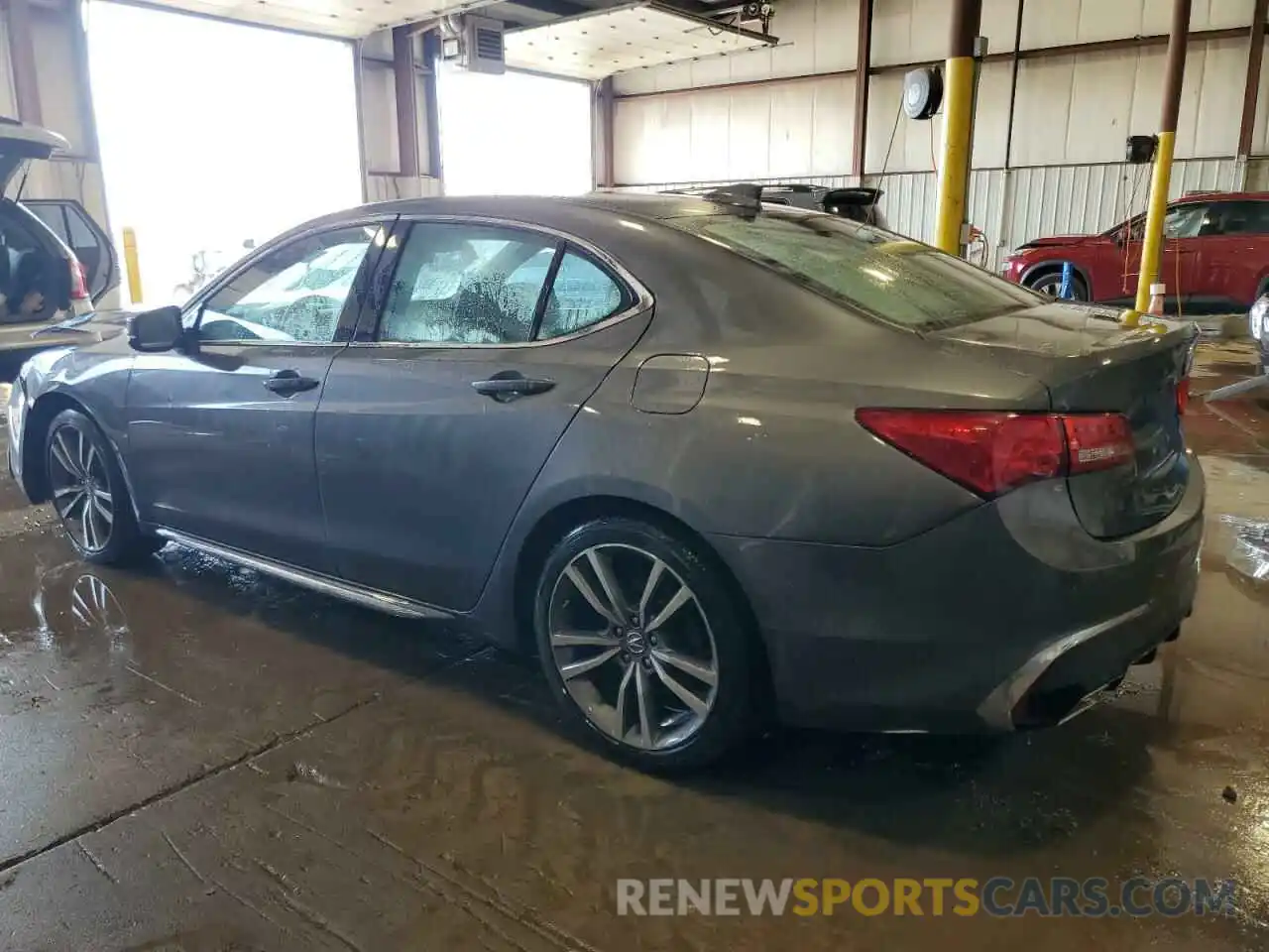 2 Photograph of a damaged car 19UUB2F46KA007759 ACURA TLX 2019