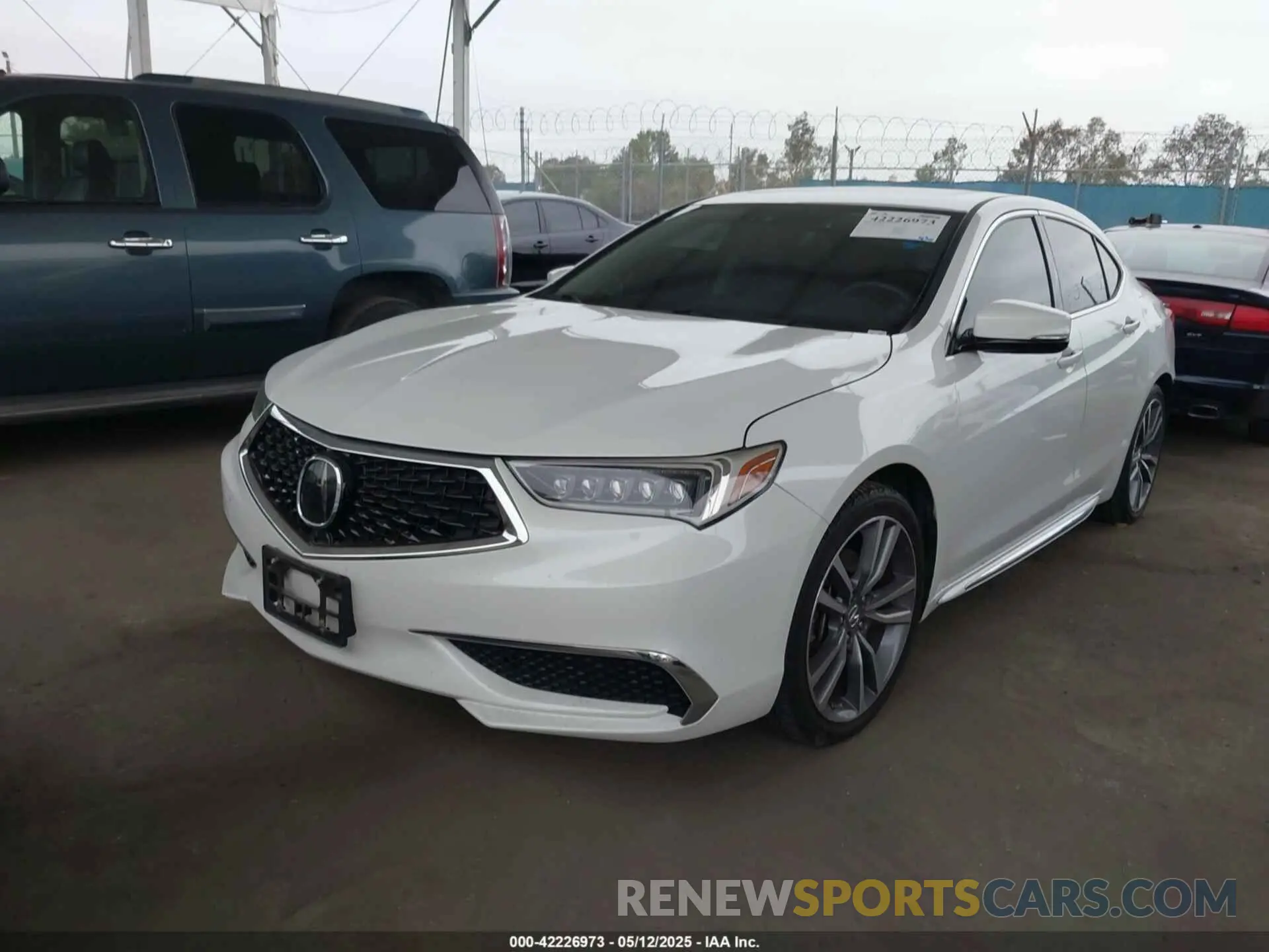 2 Photograph of a damaged car 19UUB2F49KA008906 ACURA TLX 2019