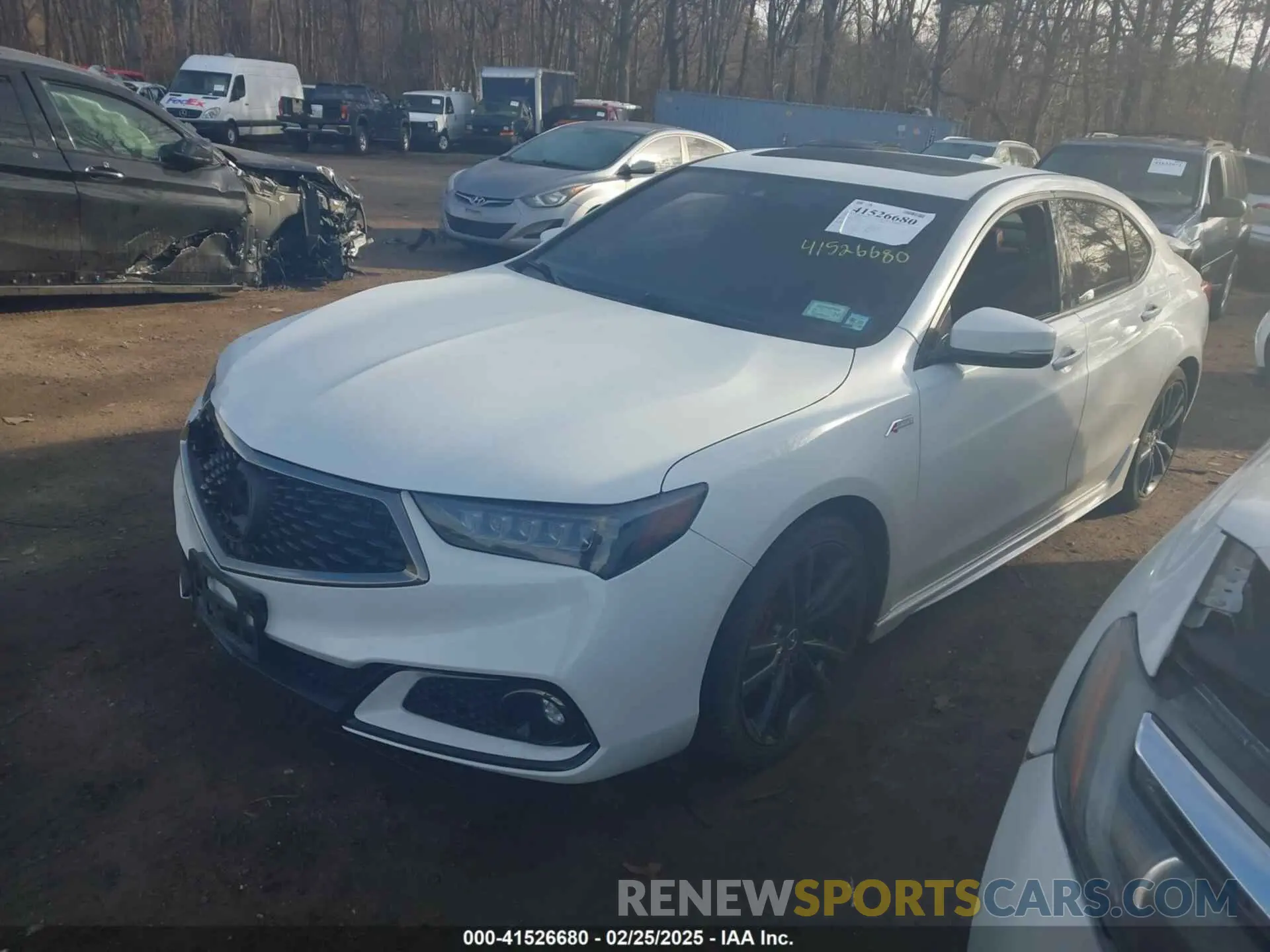 2 Photograph of a damaged car 19UUB2F65KA001243 ACURA TLX 2019