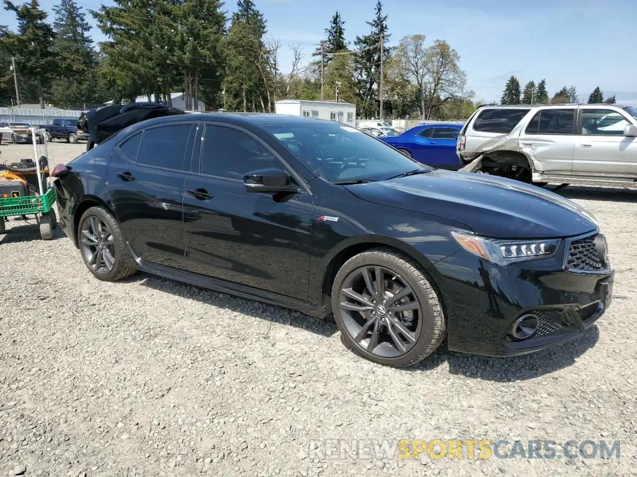 4 Photograph of a damaged car 19UUB2F69KA000449 ACURA TLX 2019