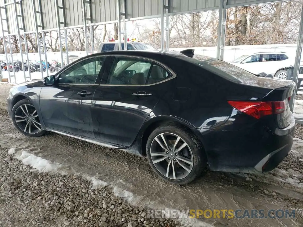 2 Photograph of a damaged car 19UUB3F42KA005559 ACURA TLX 2019