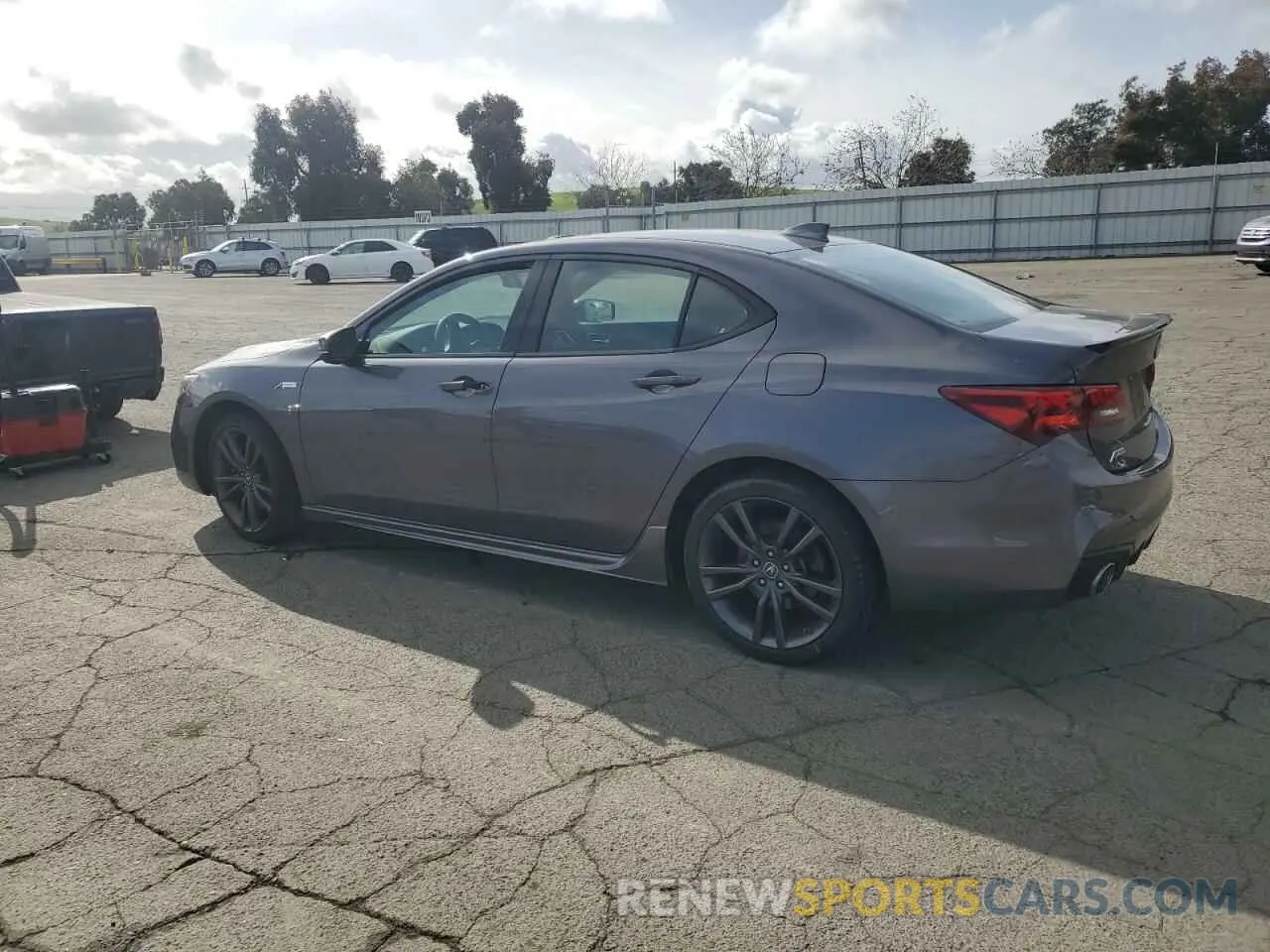2 Photograph of a damaged car 19UUB3F66KA000561 ACURA TLX 2019