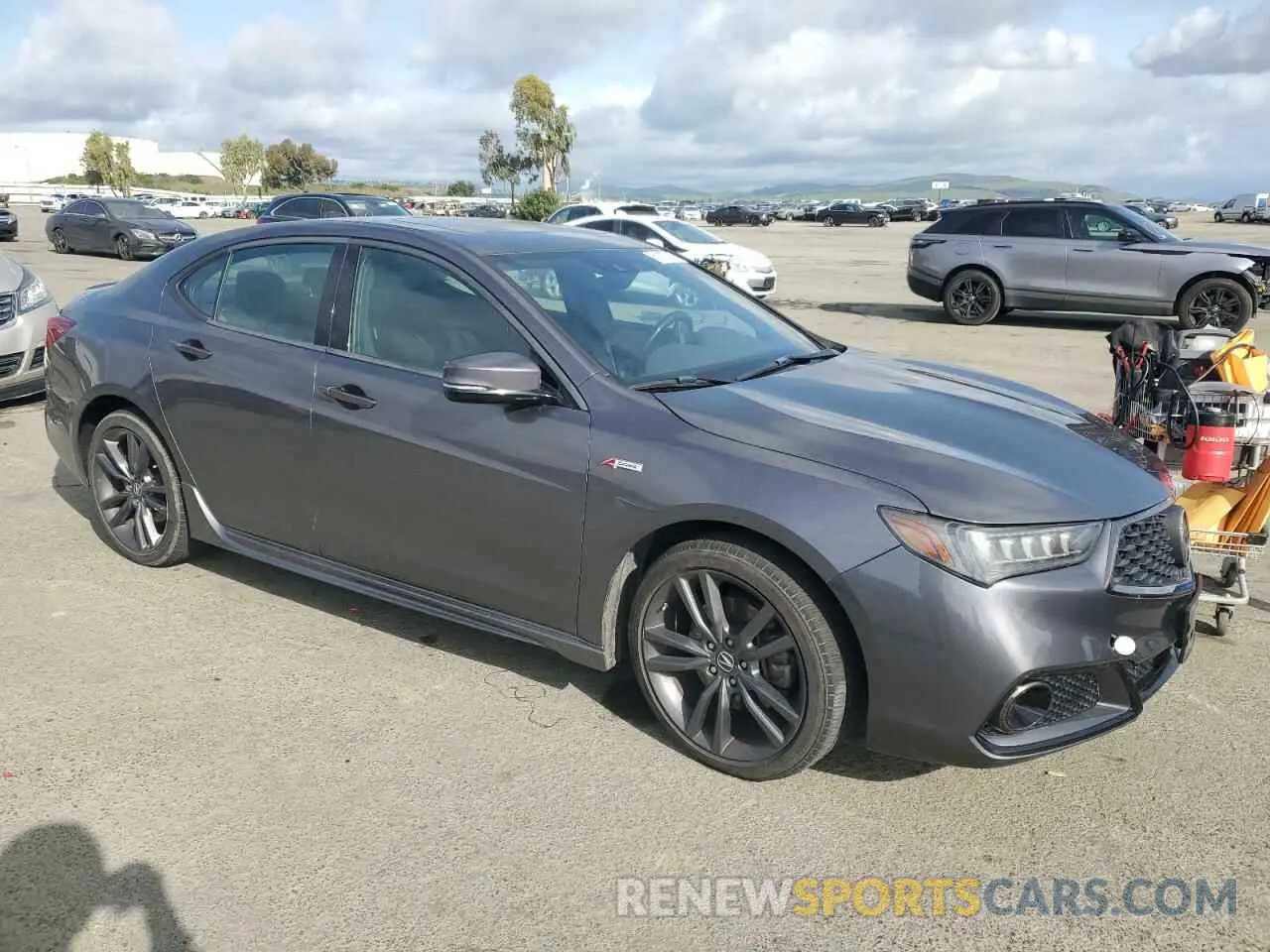 4 Photograph of a damaged car 19UUB3F66KA000561 ACURA TLX 2019