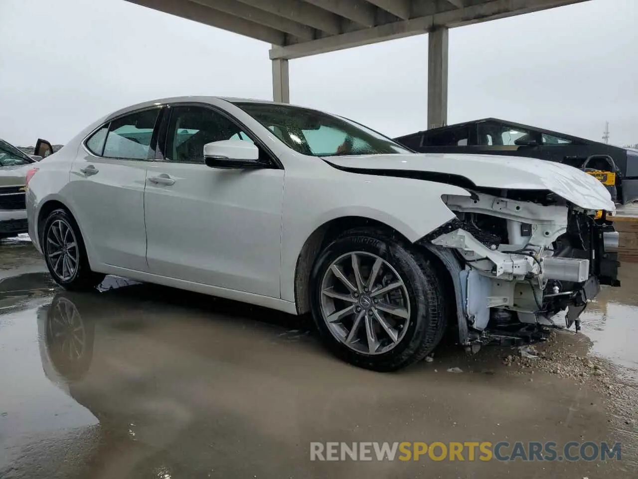 4 Photograph of a damaged car 19UUB1F32LA010029 ACURA TLX 2020